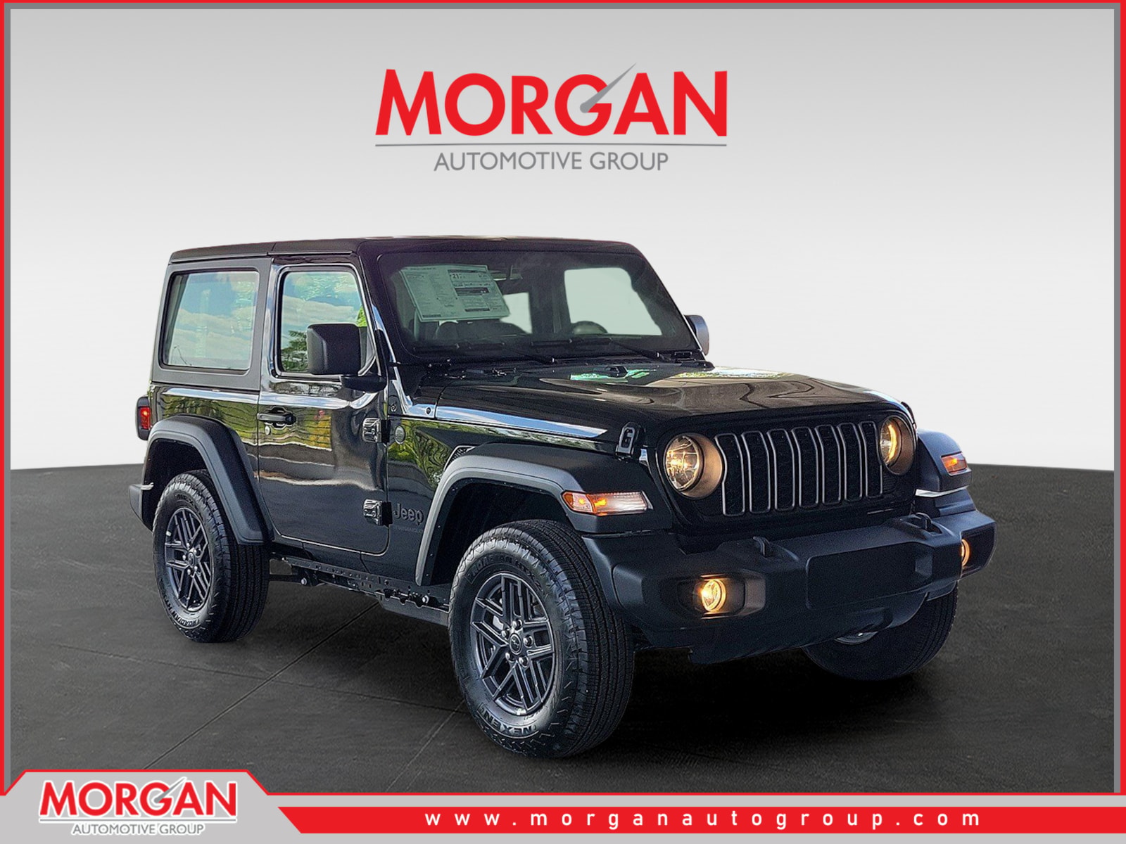 2026 Jeep Wrangler Sport in Black Clearcoat — front three-quarter view
