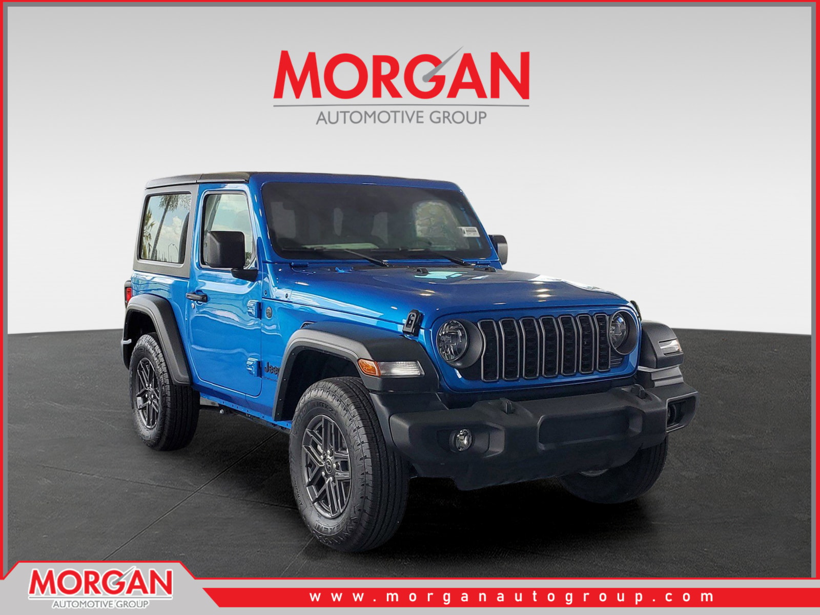 2026 Jeep Wrangler Sport S in Hydro Blue Pearlcoat — front three-quarter view