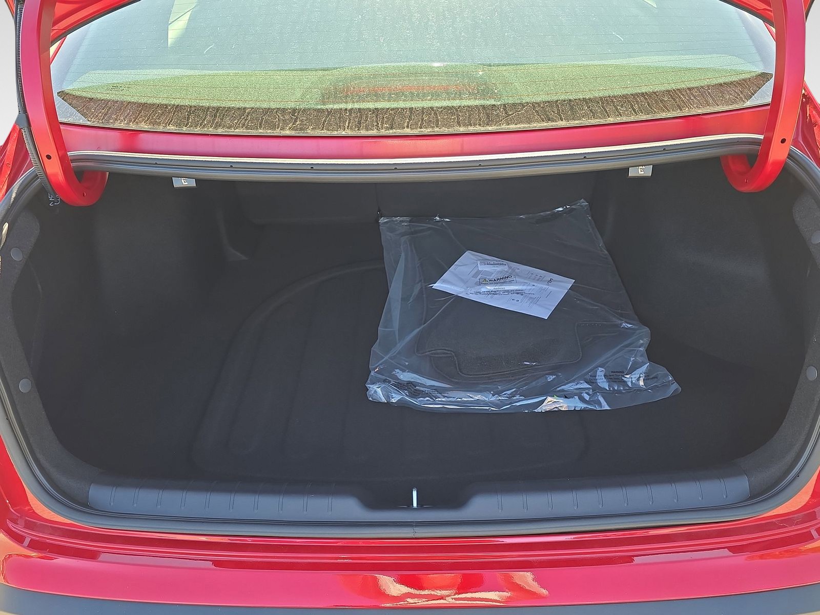 New 2026 Currant Red Kia LXS image 9