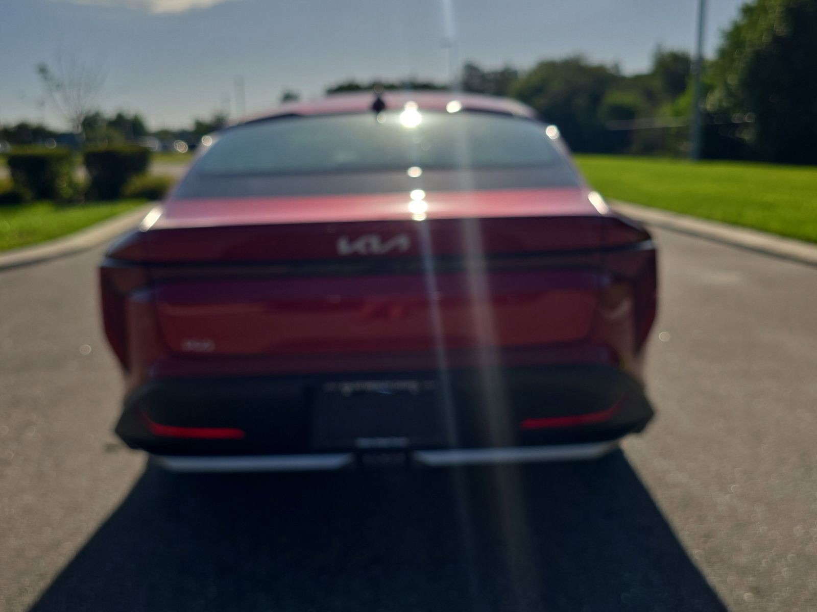 New 2026 Currant Red Kia LXS image 6