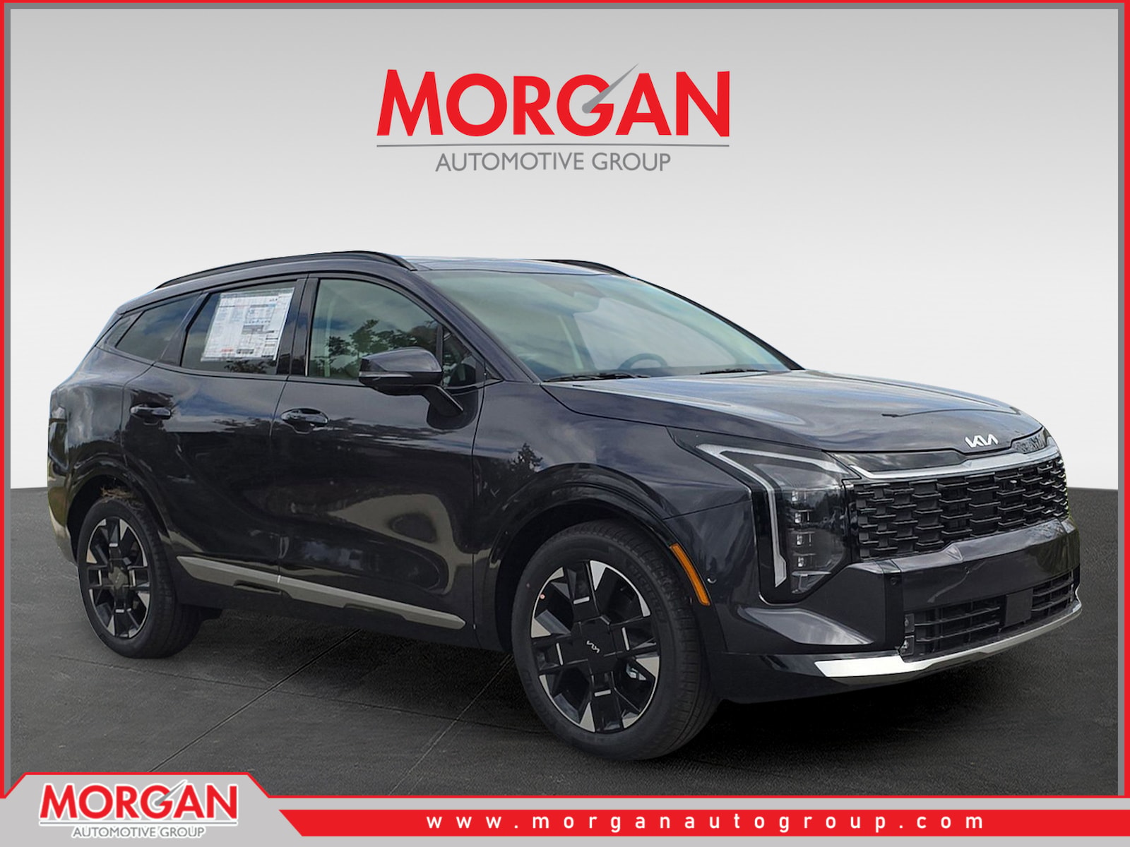2026 Kia Sportage SX-Prestige in Panthera Metal Gray — front three-quarter view