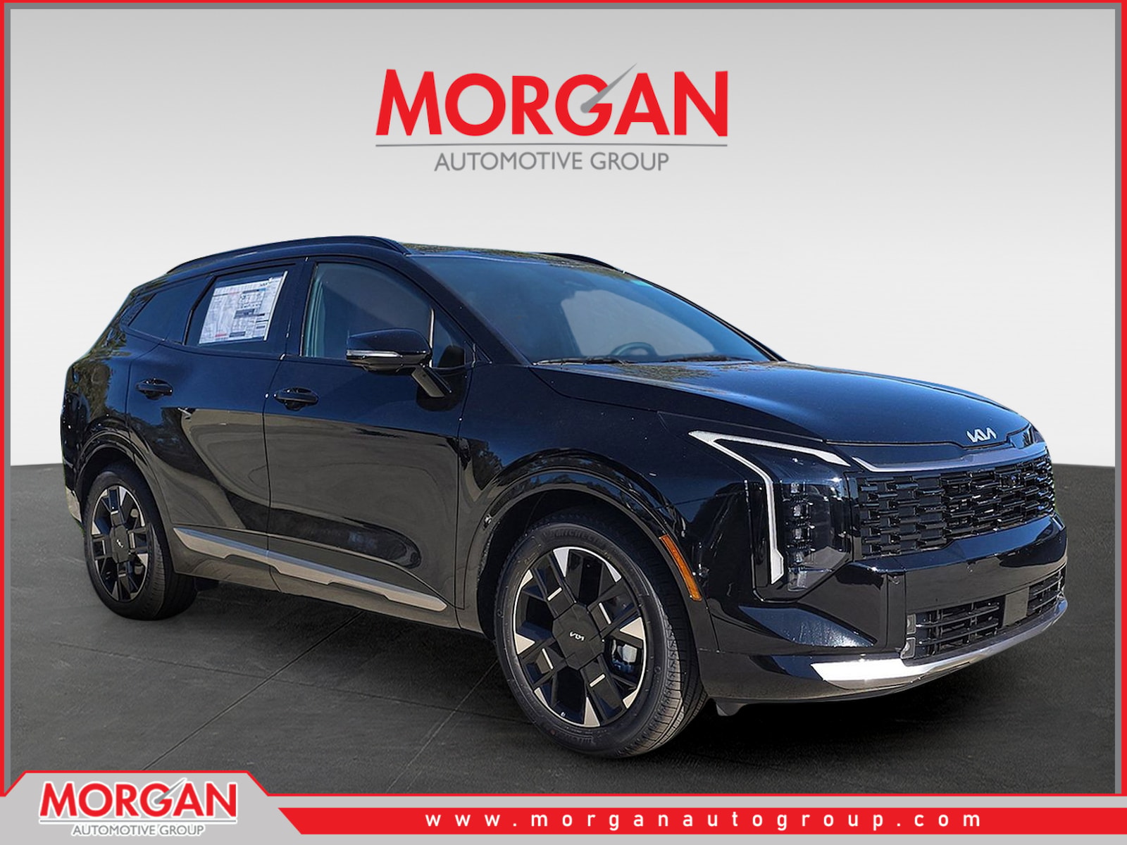 2026 Kia Sportage SX-Prestige in Ebony Black — front three-quarter view