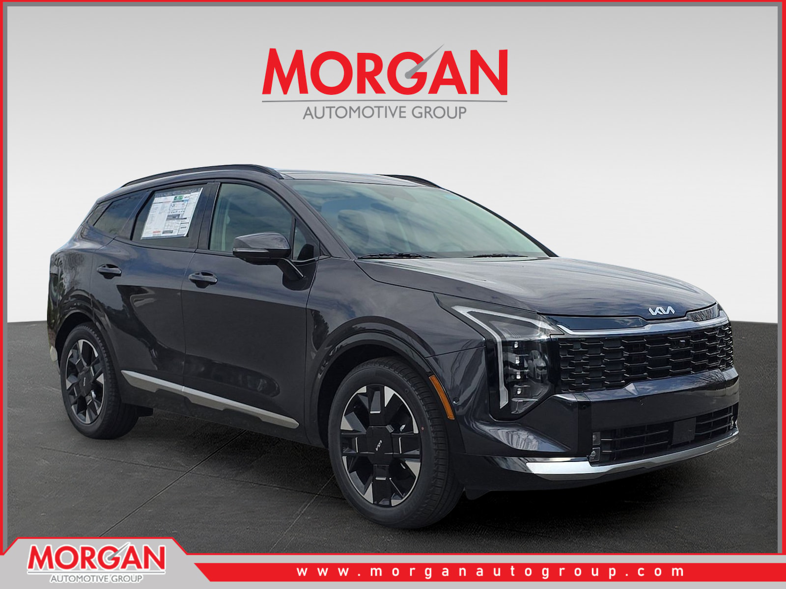 2026 Kia Sportage SX-Prestige in Panthera Metal Gray — front three-quarter view
