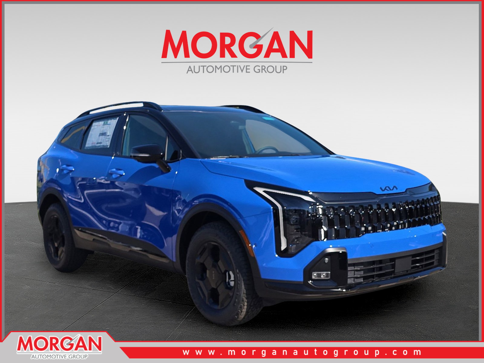 2026 Kia Sportage X-Pro Prestige in Nebular Blue/Black Roof — front three-quarter view