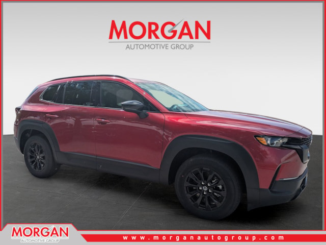 2026 Mazda CX-50 Hybrid Premium in Soul Red Crystal Metallic — front three-quarter view