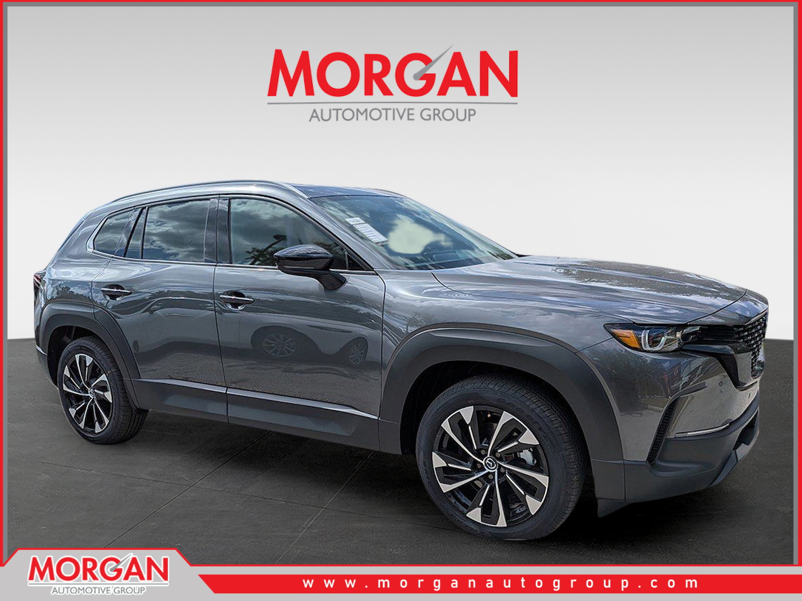2026 Mazda CX-50 Hybrid Premium Plus in Gray — front three-quarter view