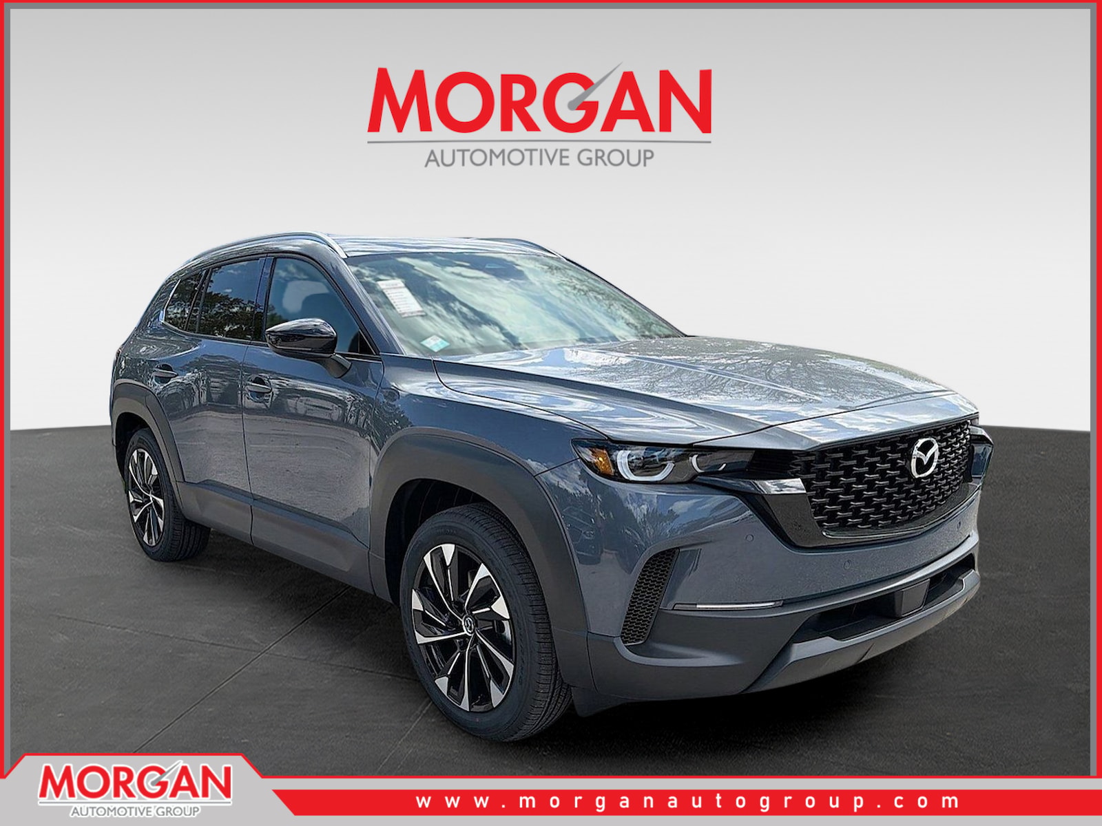 2026 Mazda CX-50 Hybrid Premium Plus in Gray — front three-quarter view