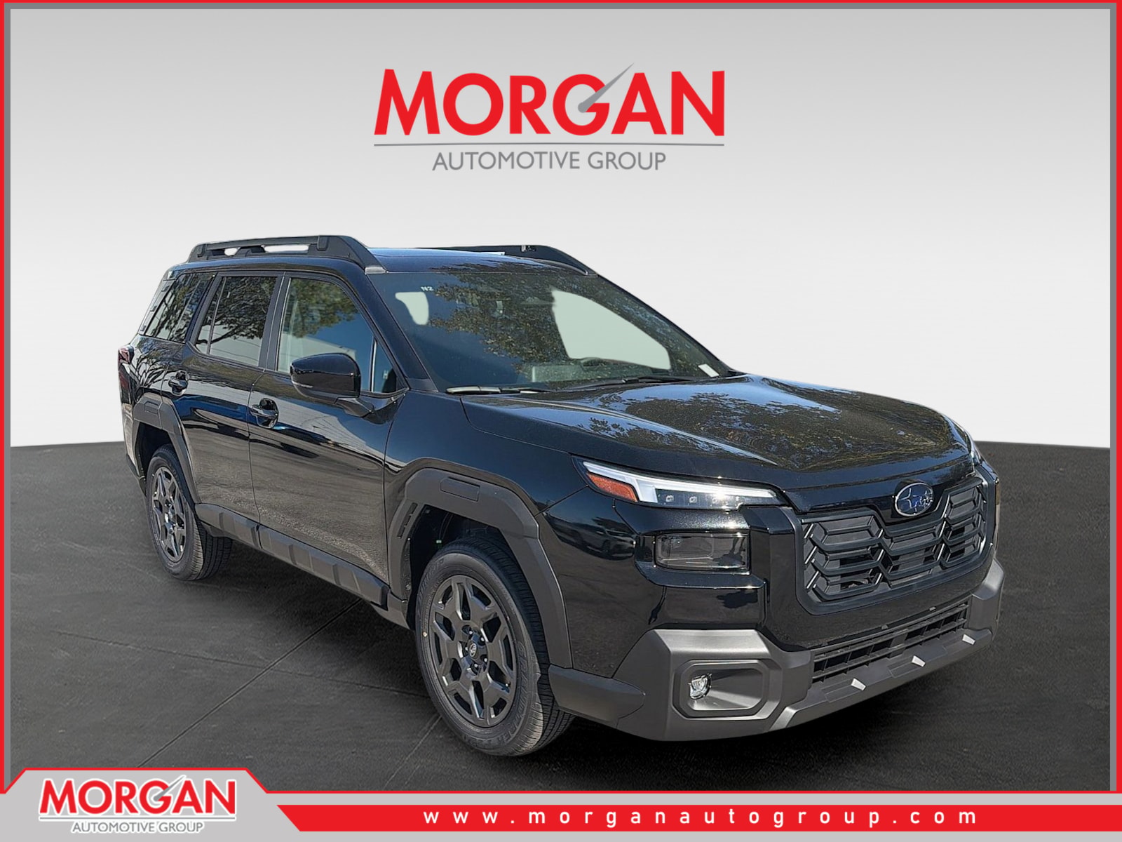 2026 Subaru Outback Premium in Crystal Black Silica — front three-quarter view