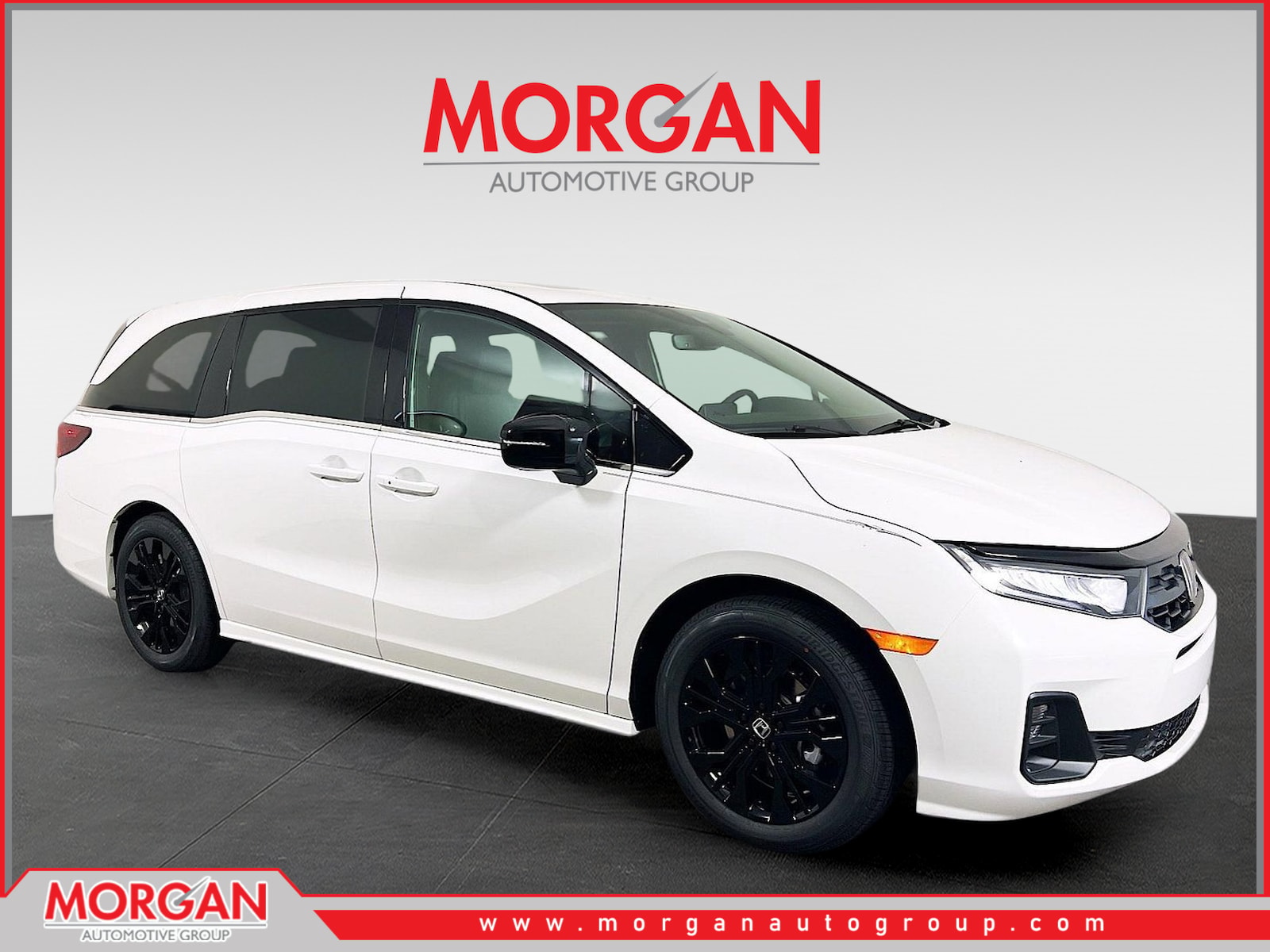 2026 Honda Odyssey Sport-L in White — front three-quarter view