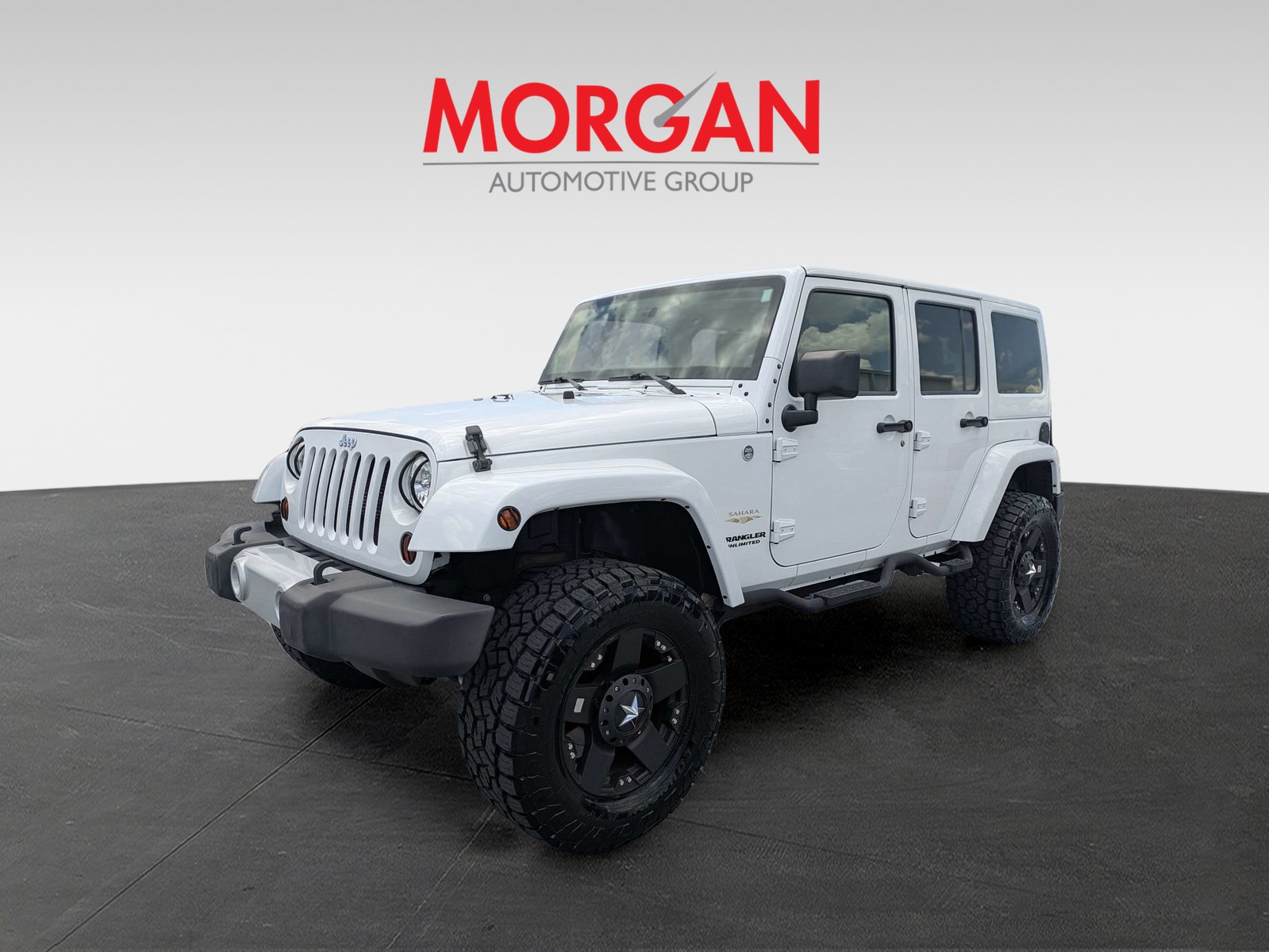Used 2013 White Jeep Unlimited Sahara image 8