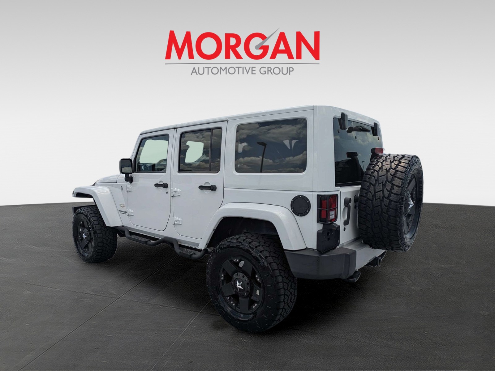 Used 2013 White Jeep Unlimited Sahara image 6