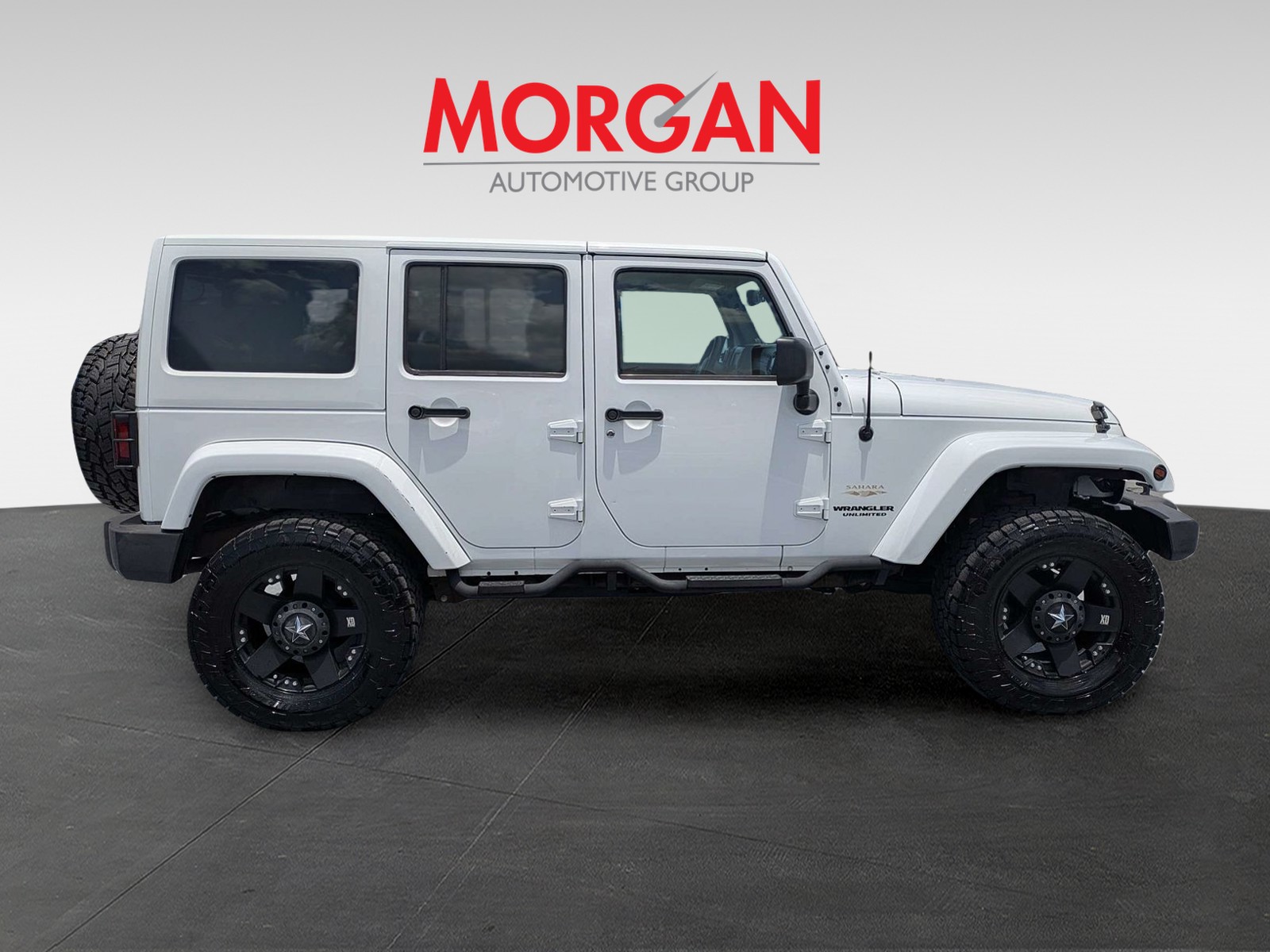 Used 2013 White Jeep Unlimited Sahara image 2