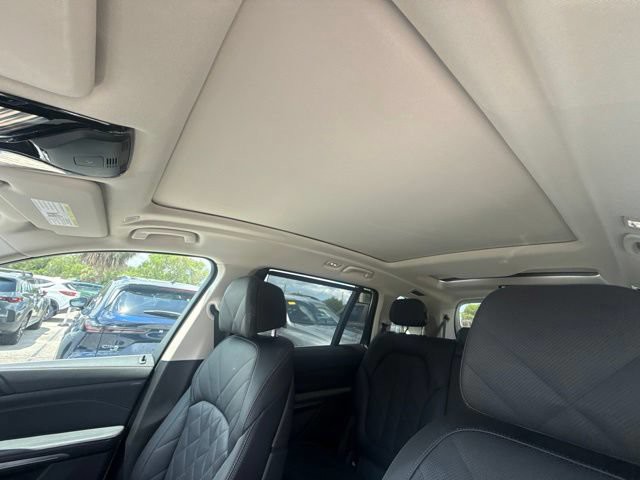 Used 2025 Mineral White Metallic BMW xDrive40i image 8