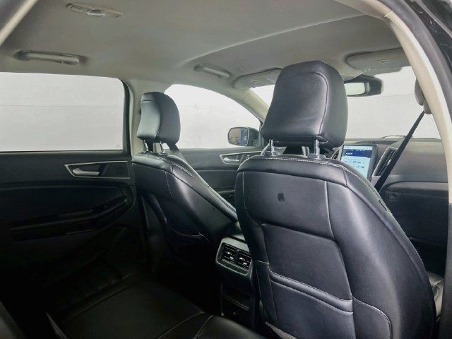 Used 2024 Agate Black Metallic Ford SEL image 9