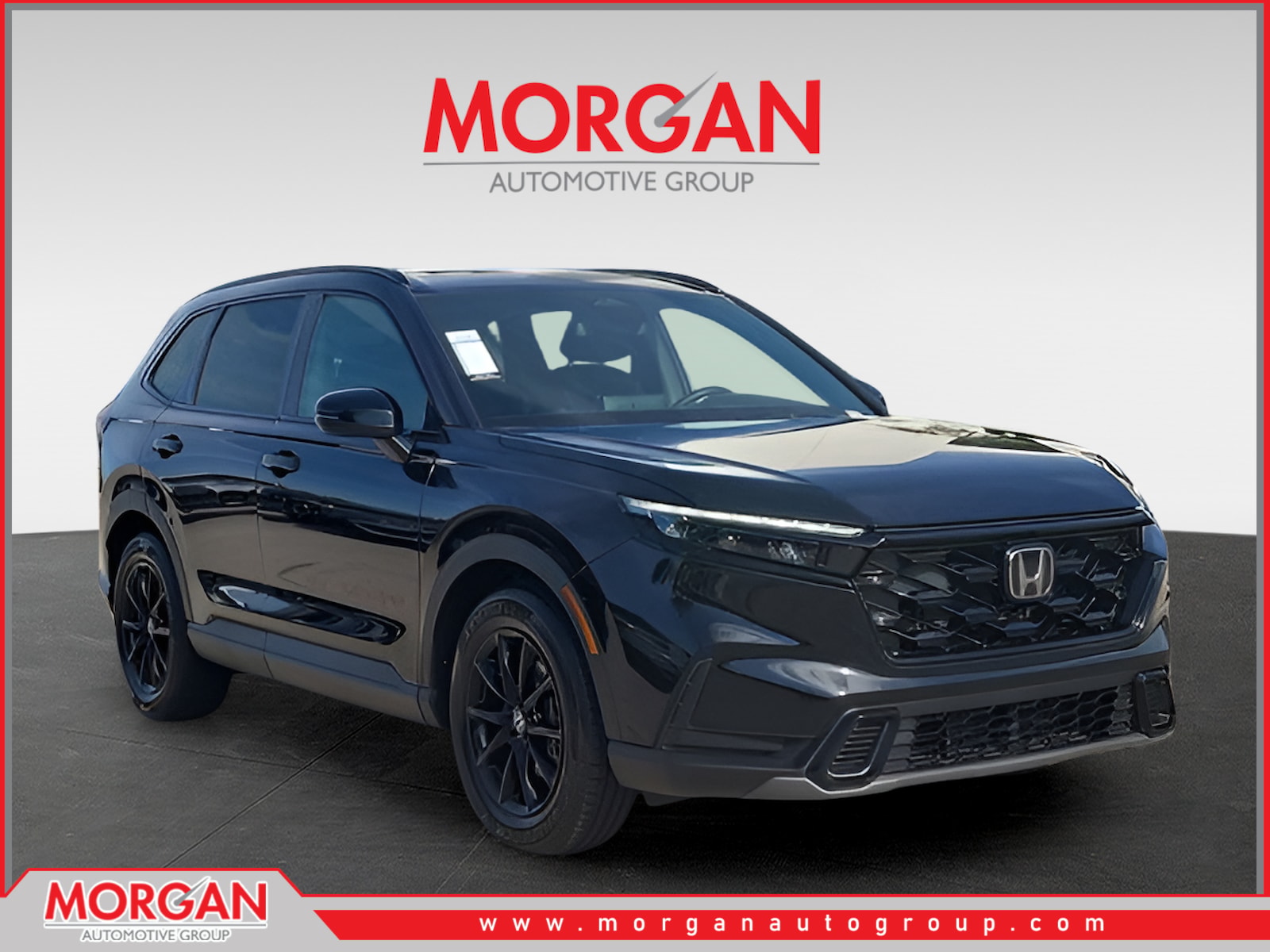2026 Honda CR-V Hybrid Sport in Crystal Black Pearl — front three-quarter view