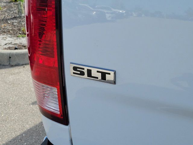 Used 2024 Bright White Clearcoat Ram SLT image 12