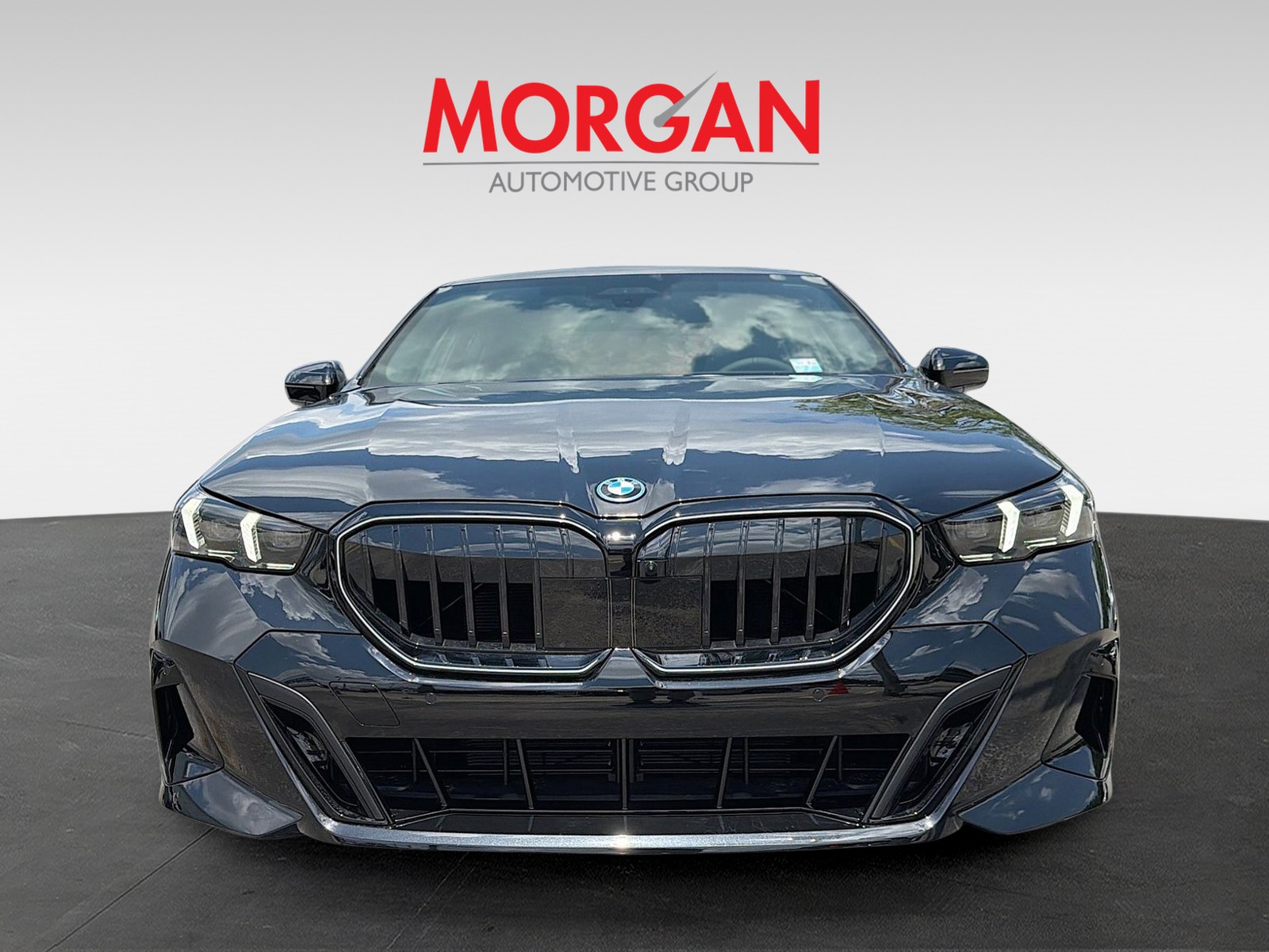 New 2027 Black Sapphire Metallic BMW 550e xDrive image 8