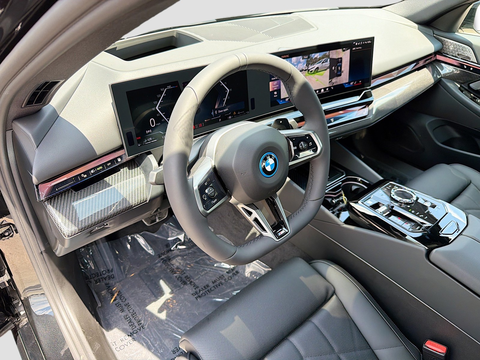 New 2027 Black Sapphire Metallic BMW 550e xDrive image 25