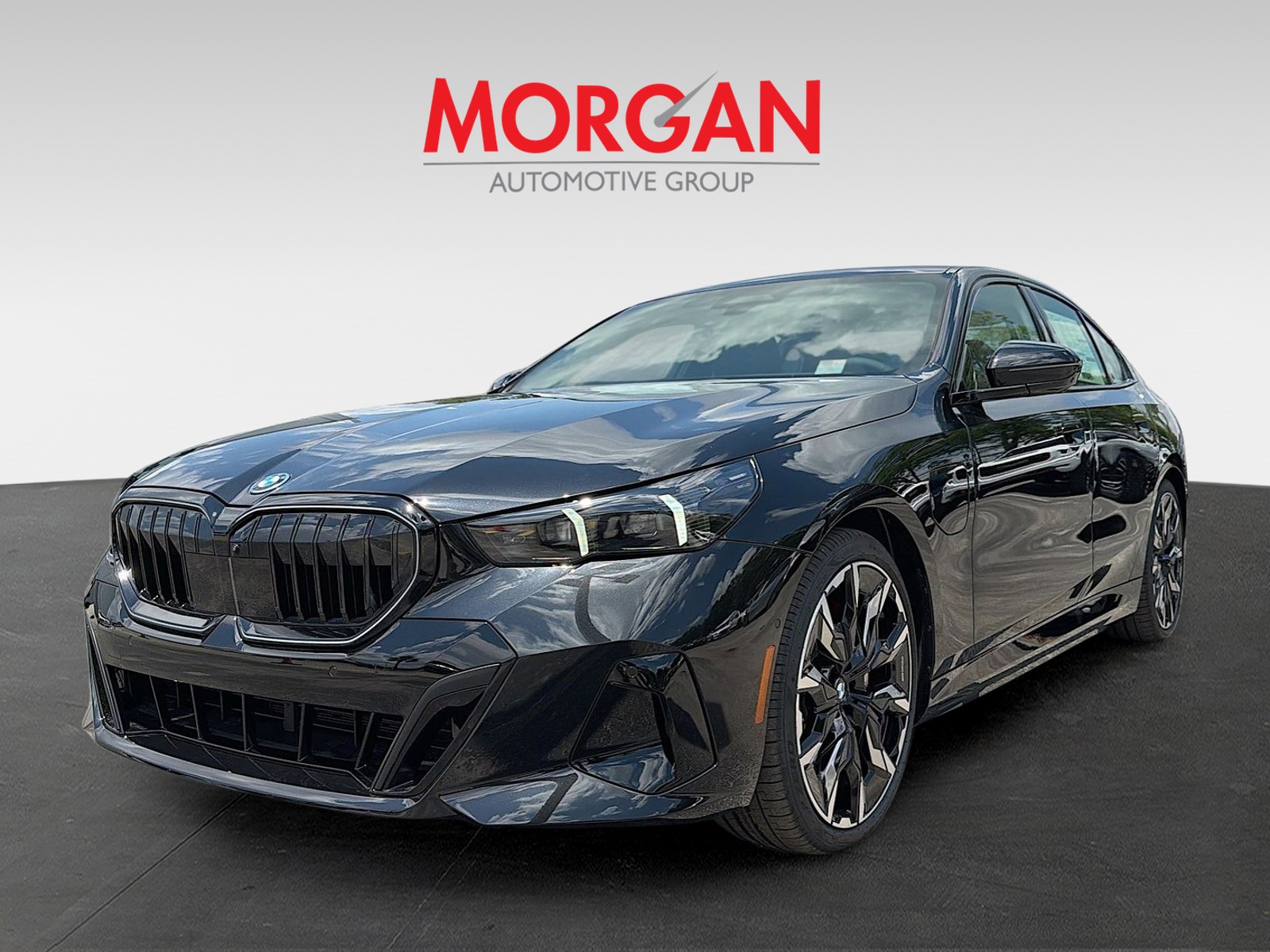 New 2027 Black Sapphire Metallic BMW 550e xDrive image 7