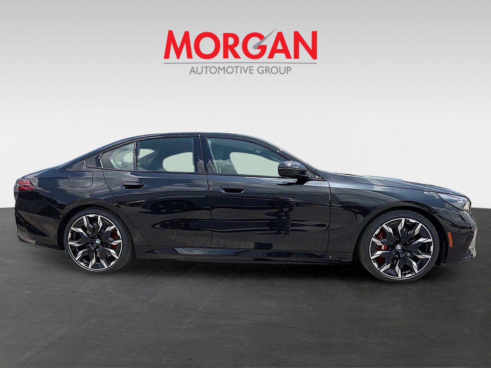 New 2027 Black Sapphire Metallic BMW 550e xDrive image 2