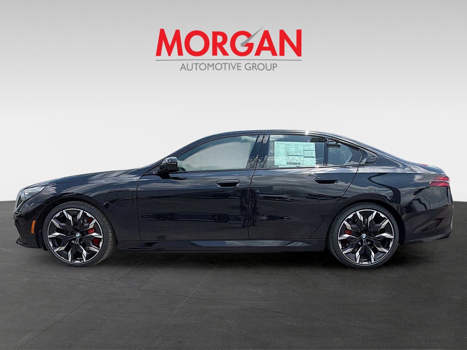 New 2027 Black Sapphire Metallic BMW 550e xDrive image 6