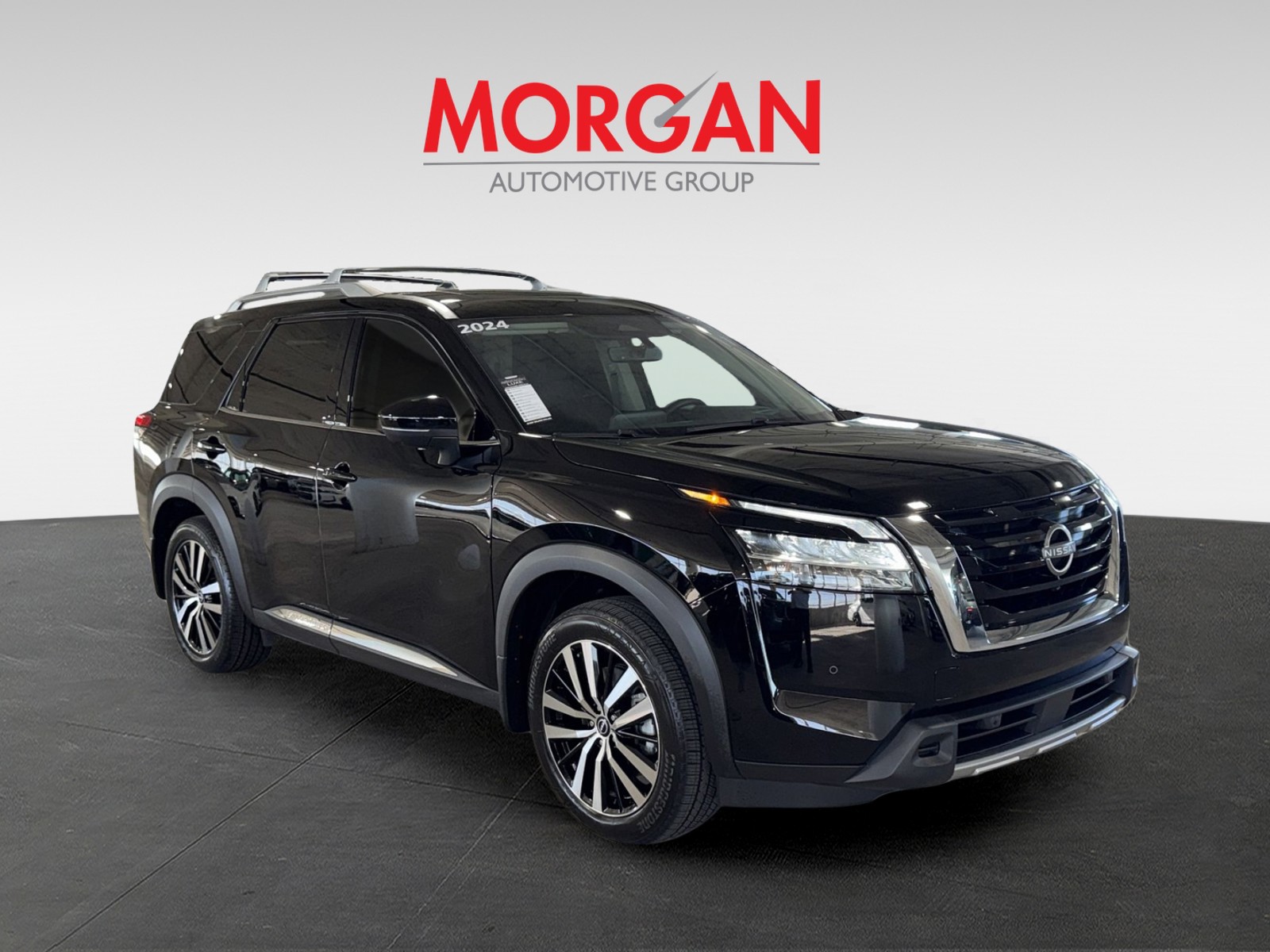 Used 2024 Black Nissan Platinum image 2
