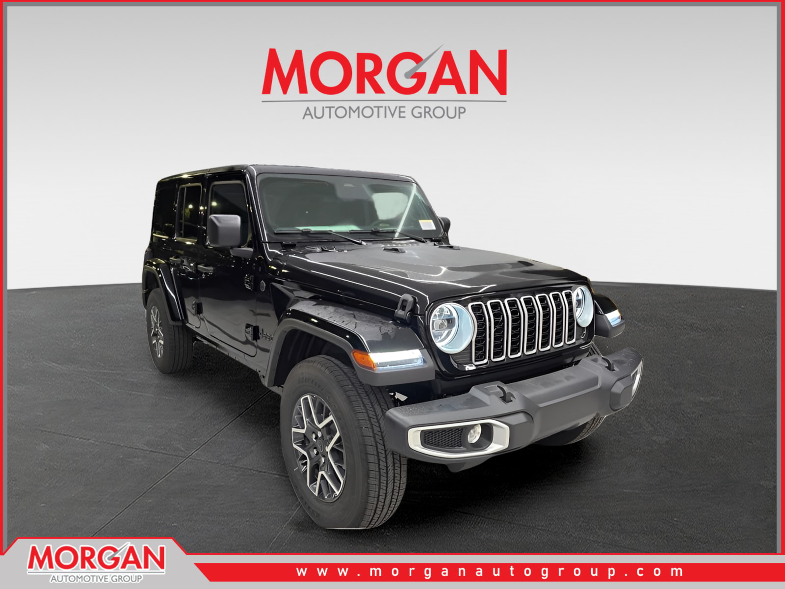 2026 Jeep Wrangler Sahara in Black Clearcoat — front three-quarter view