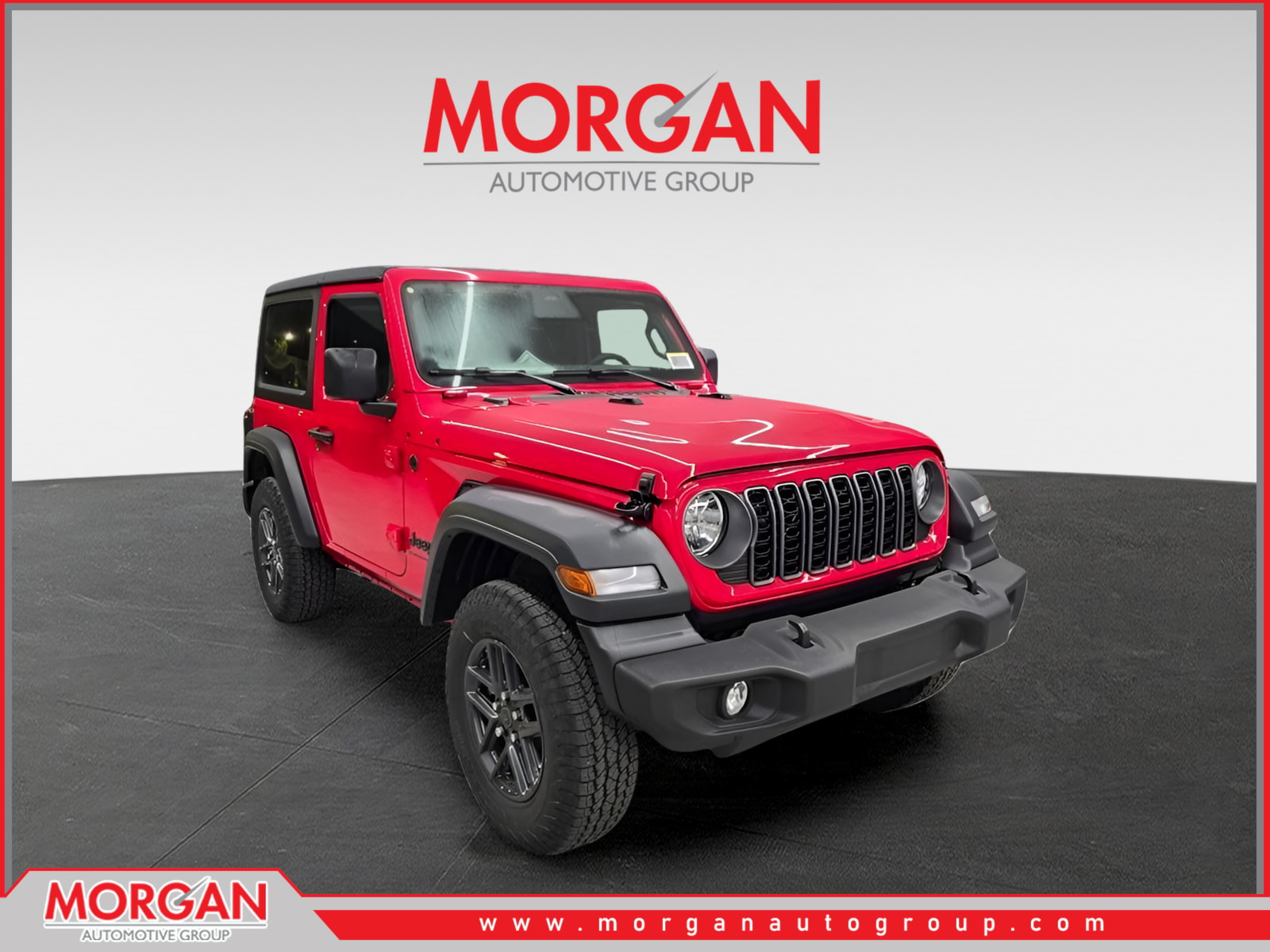 2026 Jeep Wrangler Sport S in Firecracker Red Clearcoat — front three-quarter view
