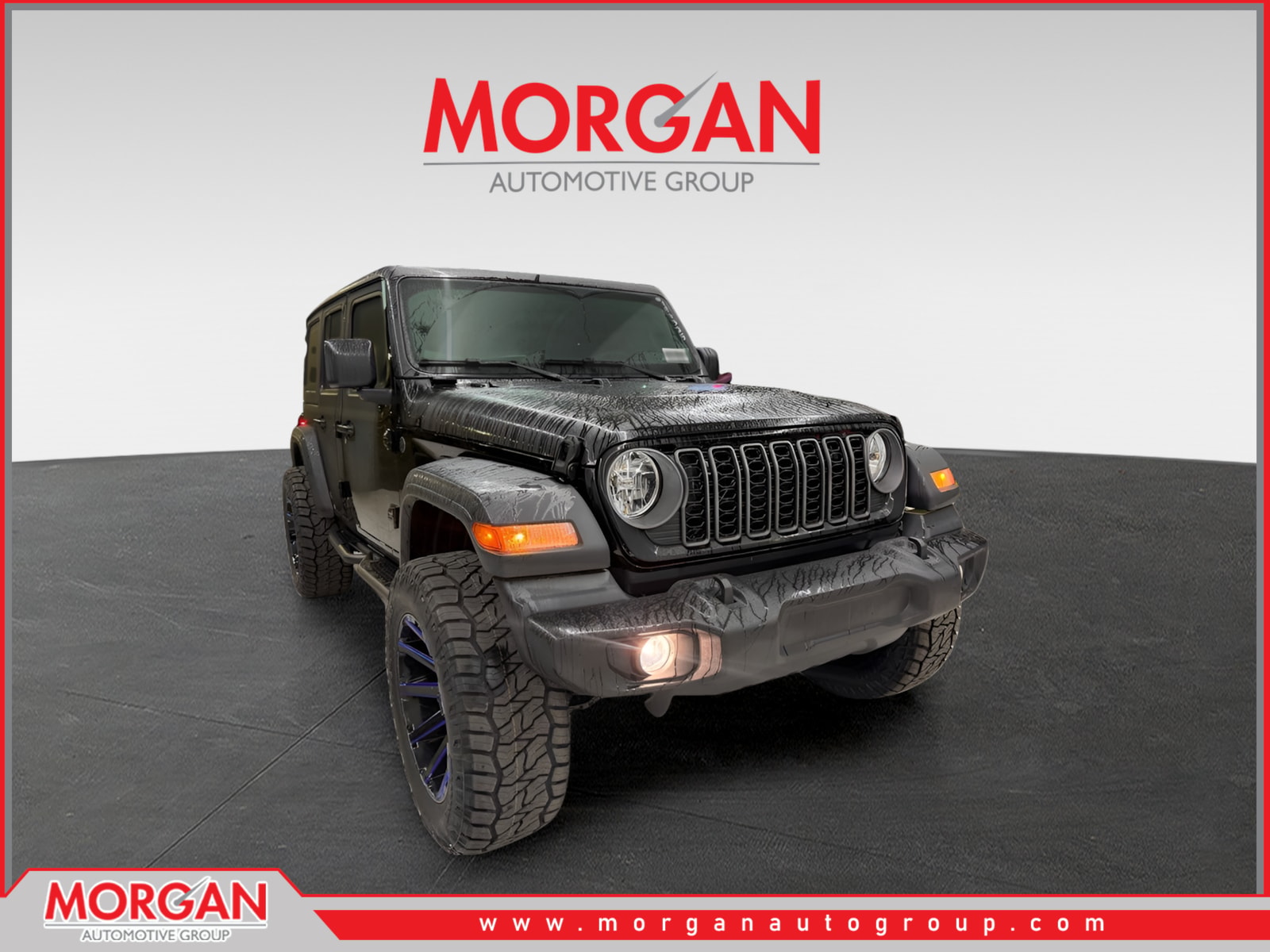 2026 Jeep Wrangler Sport in Black Clearcoat — front three-quarter view
