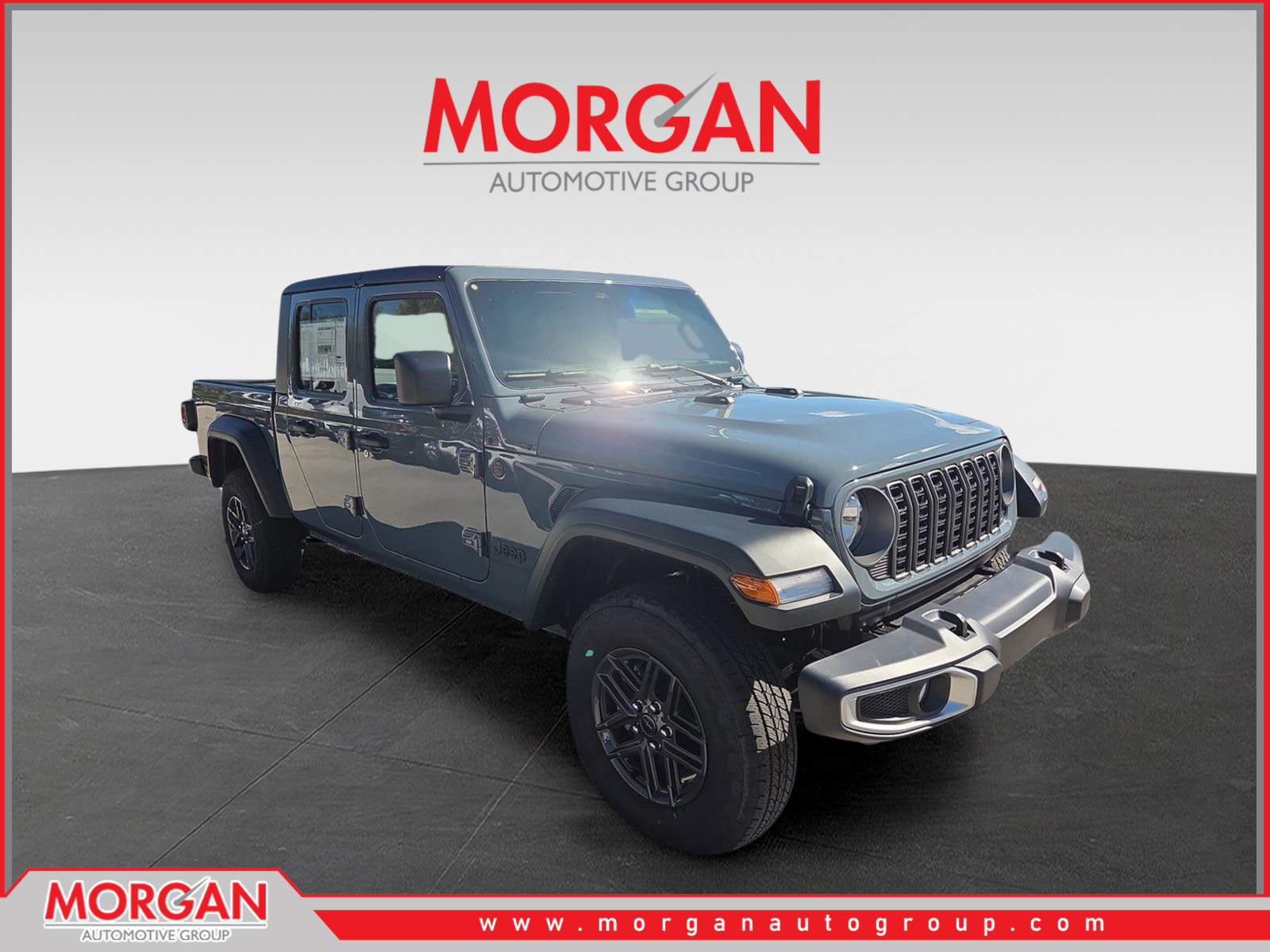 2026 Jeep Gladiator Sport S in Gray — front three-quarter view