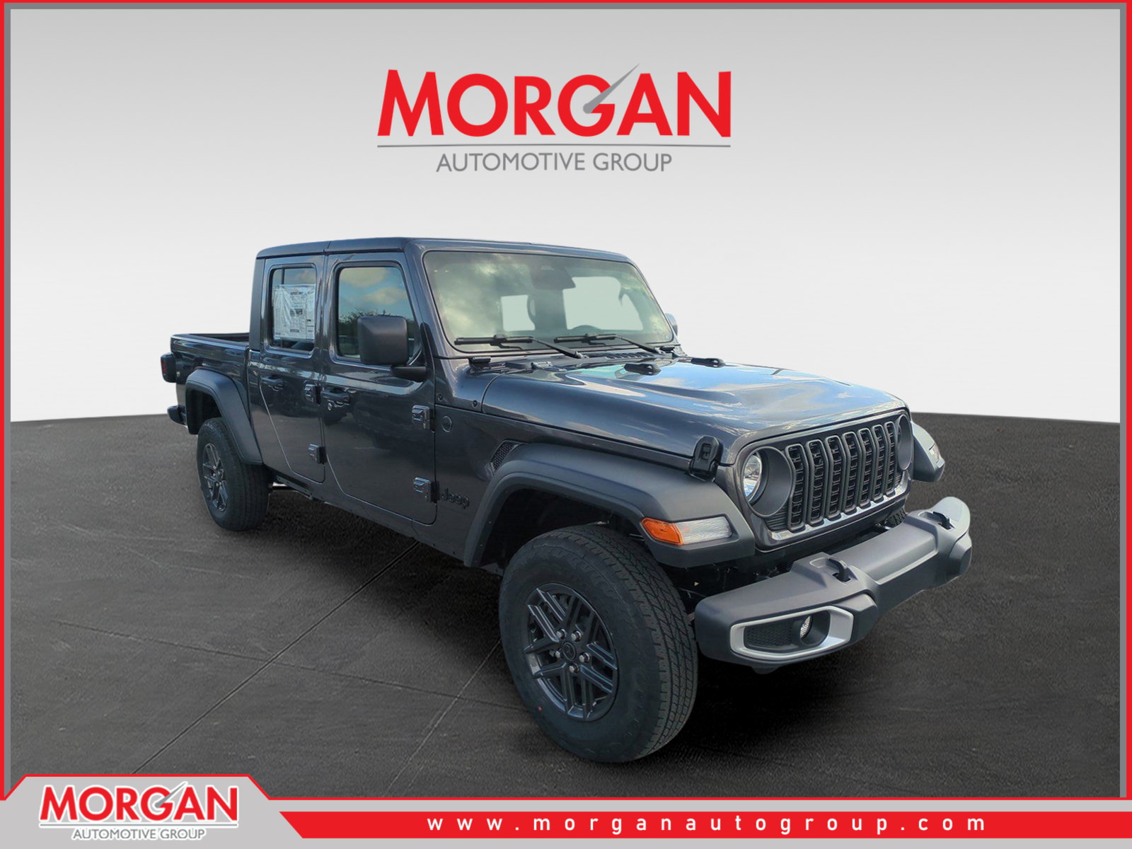 2026 Jeep Gladiator Sport S in Gray — front three-quarter view