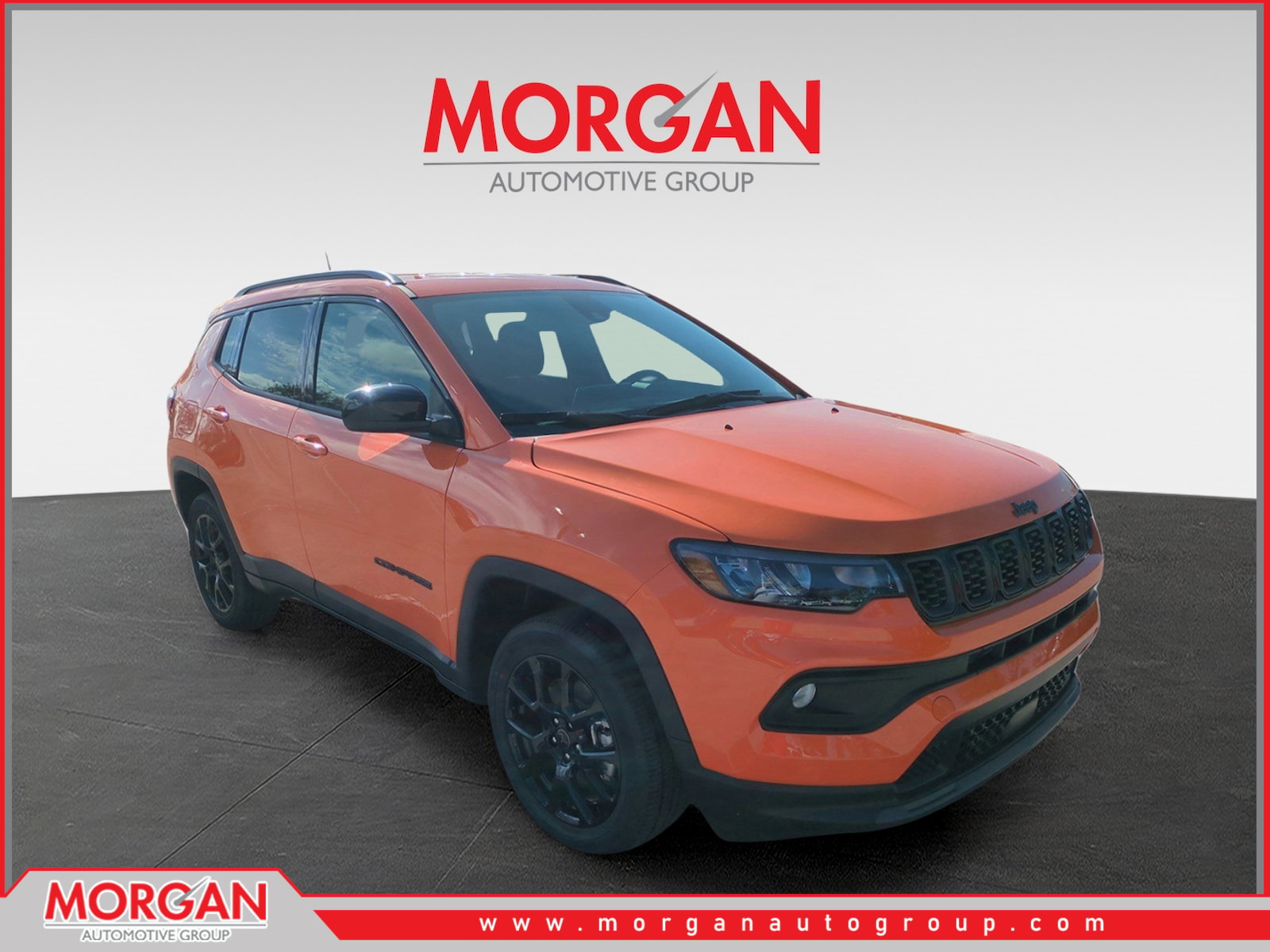 2026 Jeep Compass Latitude in Orange — front three-quarter view