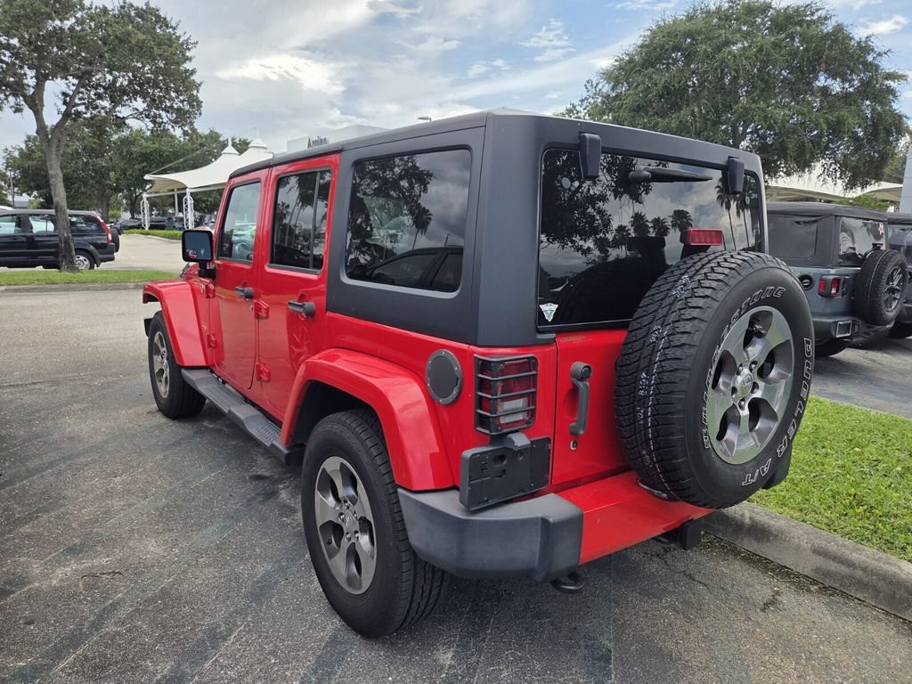 Used 2018 Red Jeep Unlimited Sahara image 4