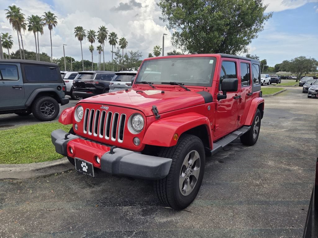 Used 2018 Red Jeep Unlimited Sahara image 3