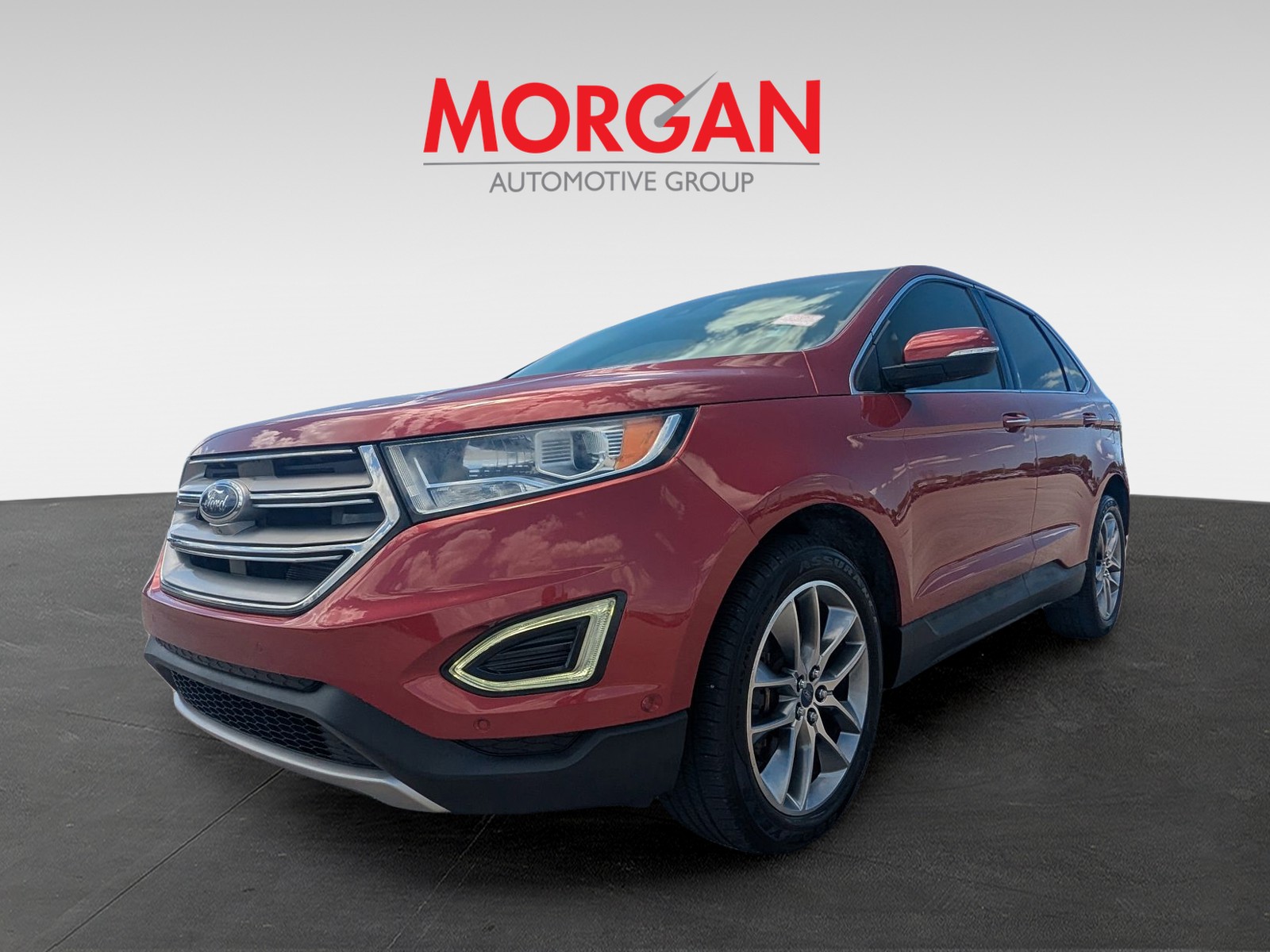 Used 2015 Ruby Red Metallic Tinted Clearcoat Ford Titanium image 9