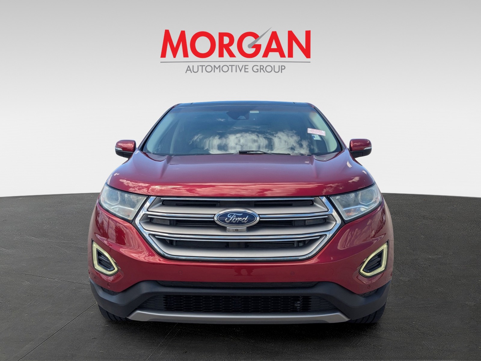 Used 2015 Ruby Red Metallic Tinted Clearcoat Ford Titanium image 3