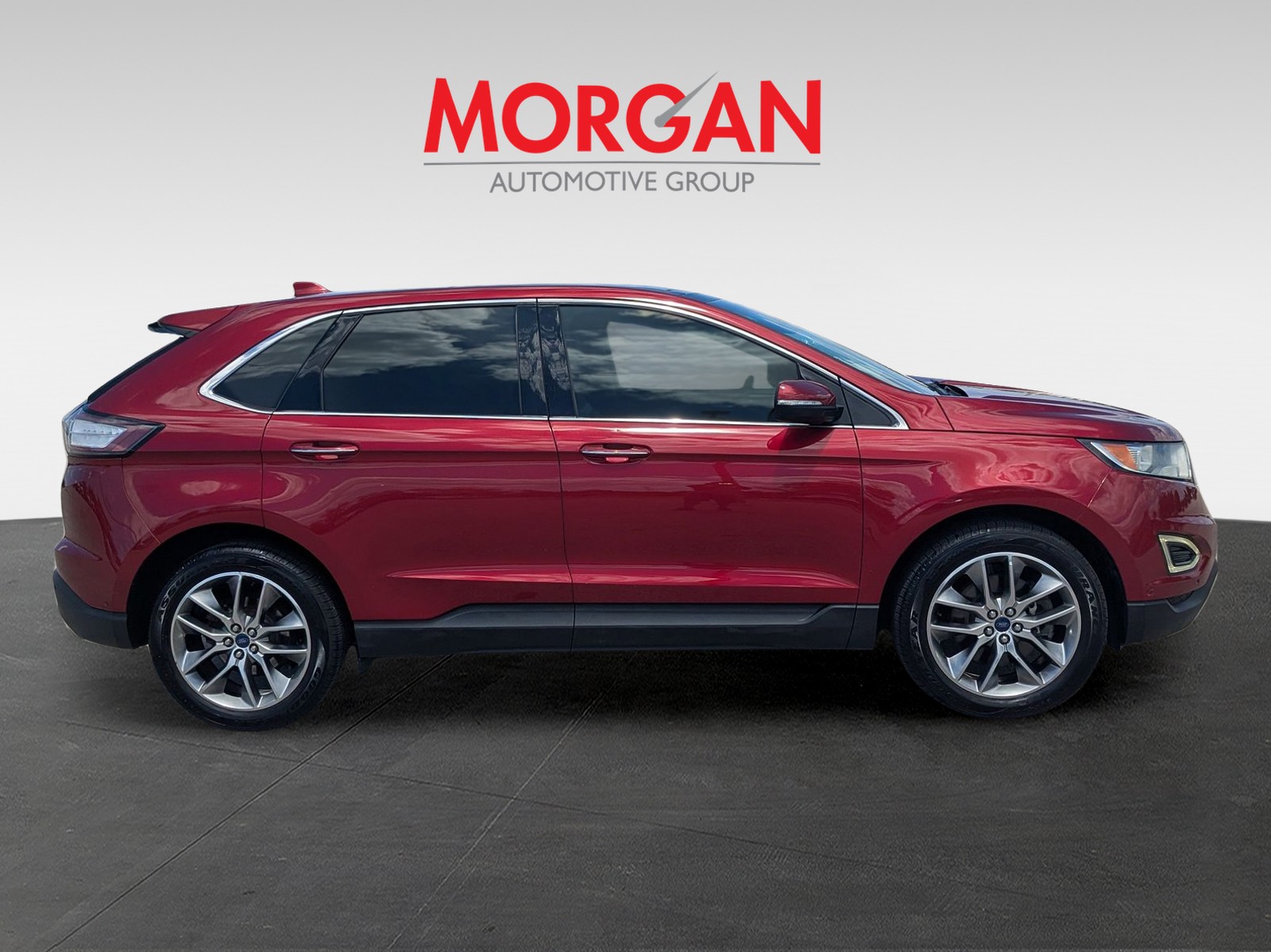 Used 2015 Ruby Red Metallic Tinted Clearcoat Ford Titanium image 4