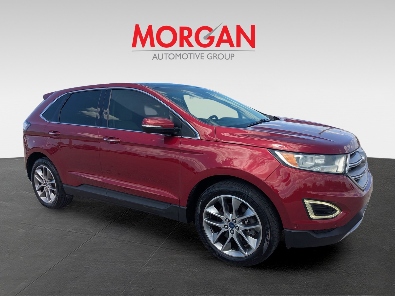 Used 2015 Ruby Red Metallic Tinted Clearcoat Ford Titanium image 2