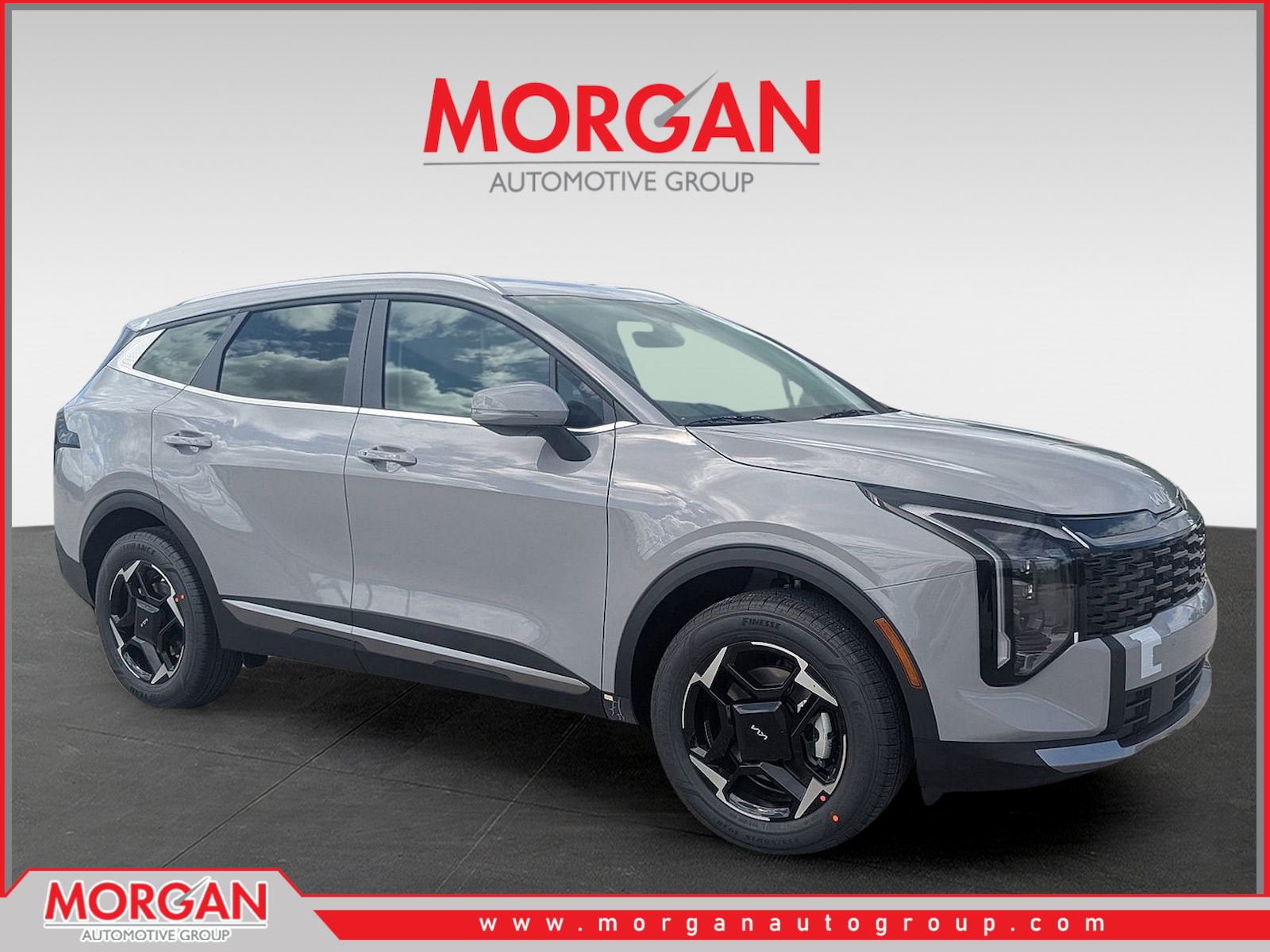 2026 Kia Sportage Hybrid EX in Wolf Gray — front three-quarter view