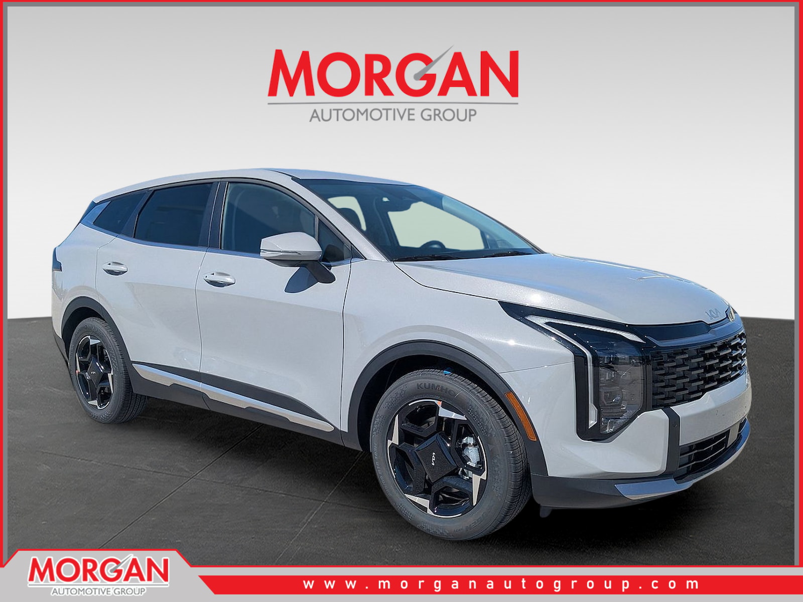 2026 Kia Sportage EX in Wolf Gray — front three-quarter view