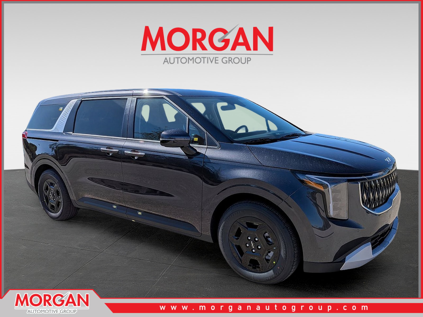 2026 Kia Carnival LXS in Panthera Metal — front three-quarter view