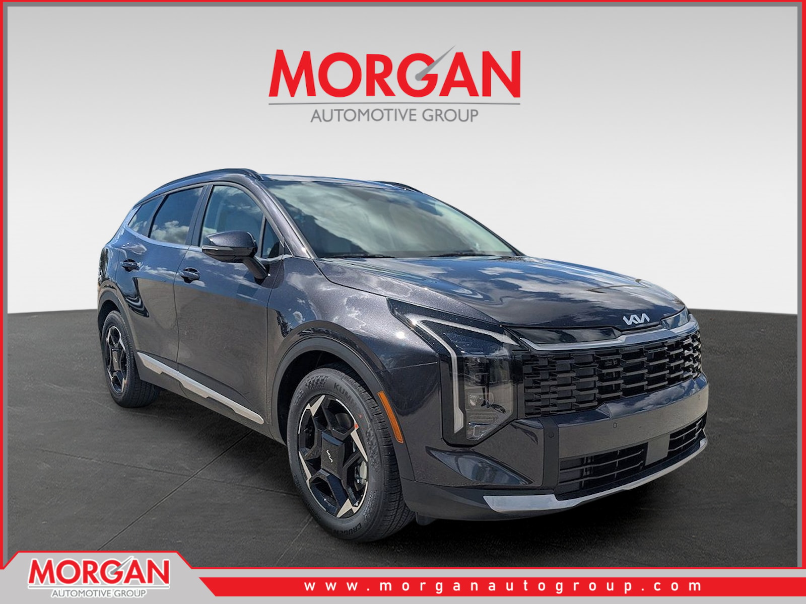 2026 Kia Sportage EX in Panthera Metal Gray — front three-quarter view