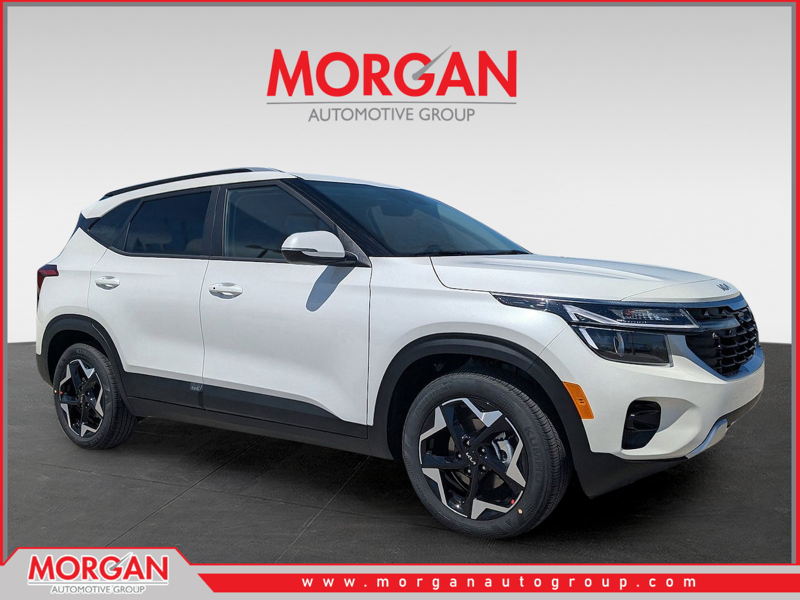 2026 Kia Seltos S in Snow White Pearl — front three-quarter view