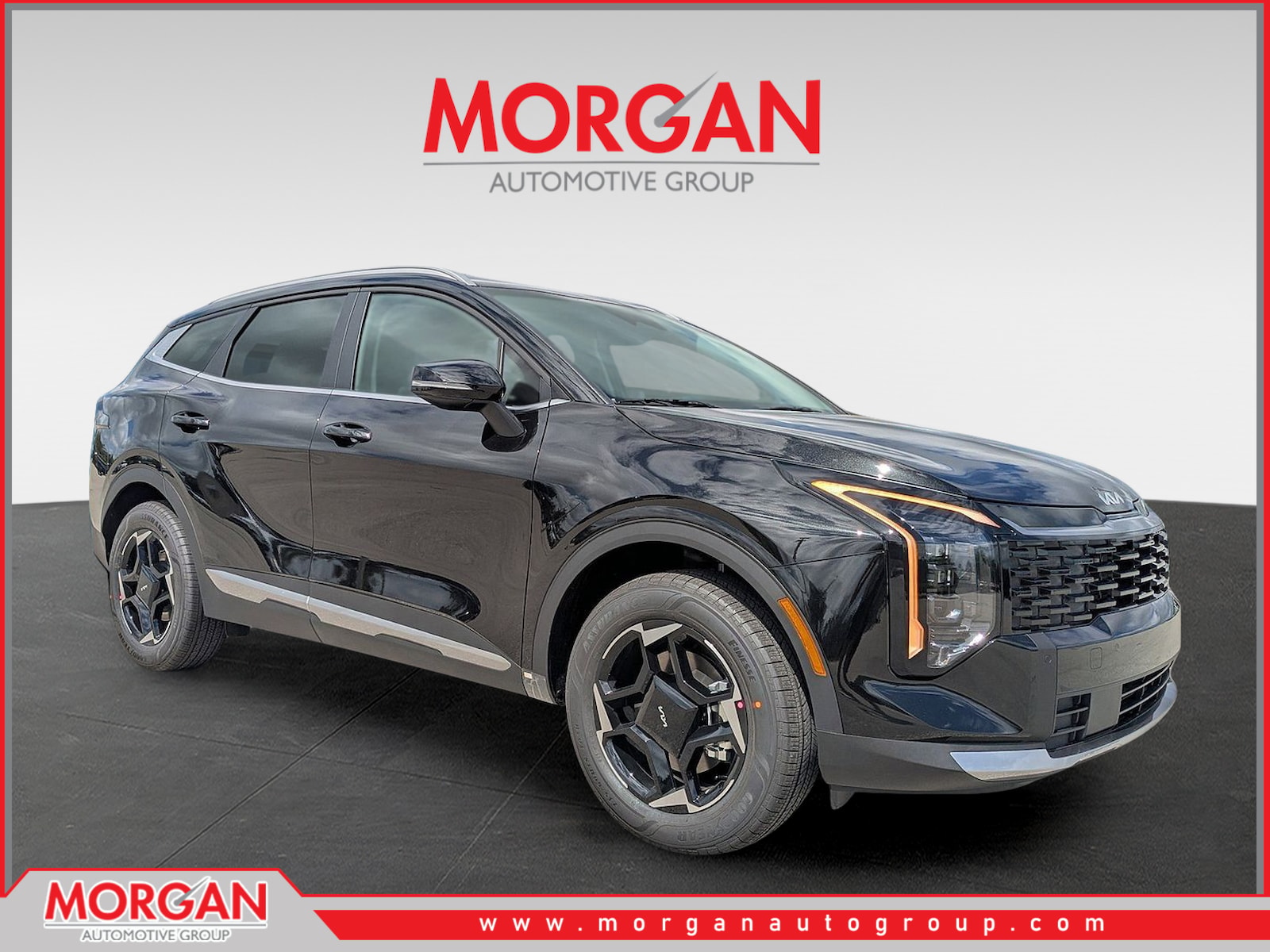 2026 Kia Sportage Hybrid EX in Fusion Black — front three-quarter view