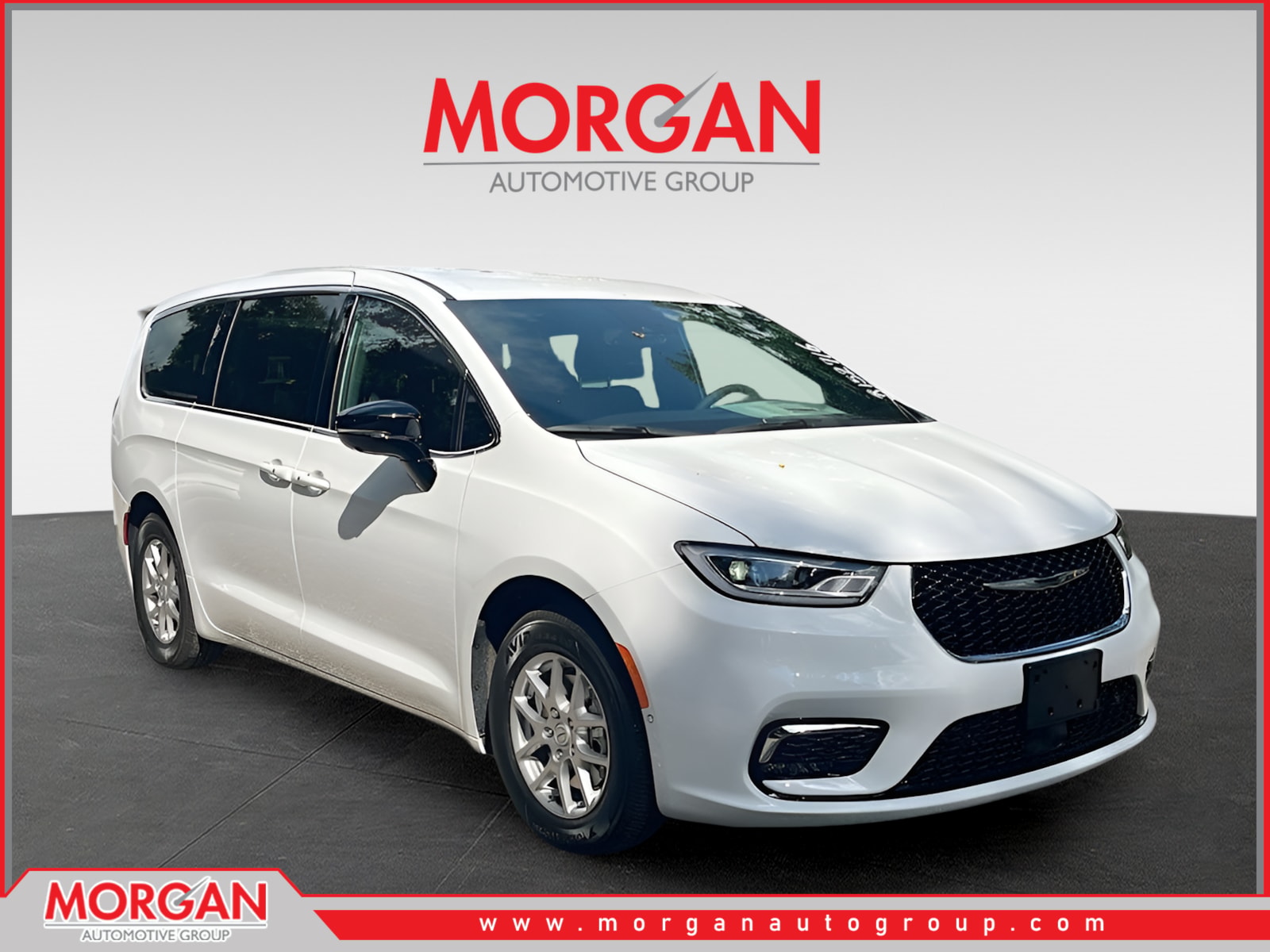 2026 Chrysler Pacifica Select in White — front three-quarter view