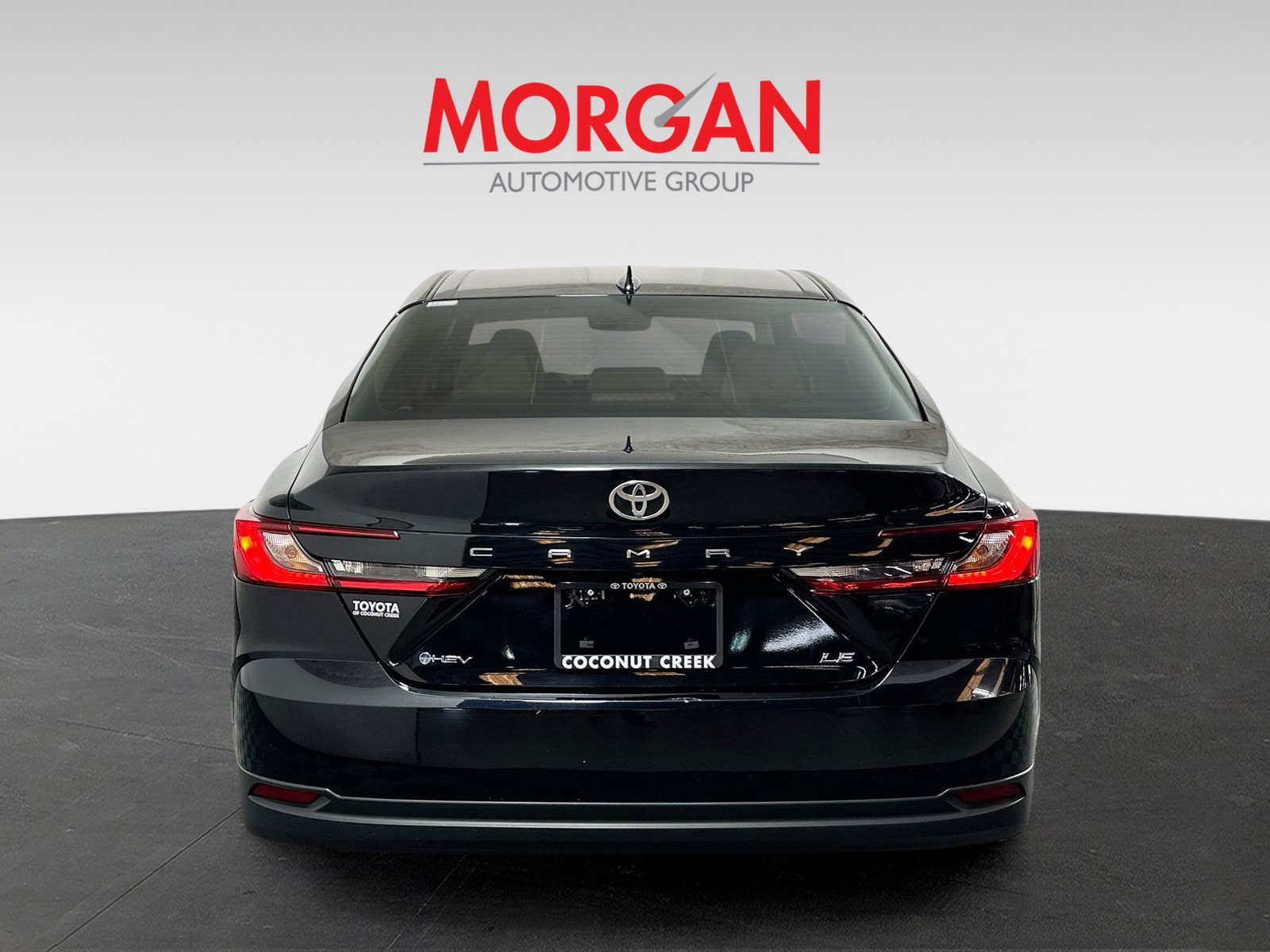 Used 2025 Midnight Black Metallic Toyota LE image 4