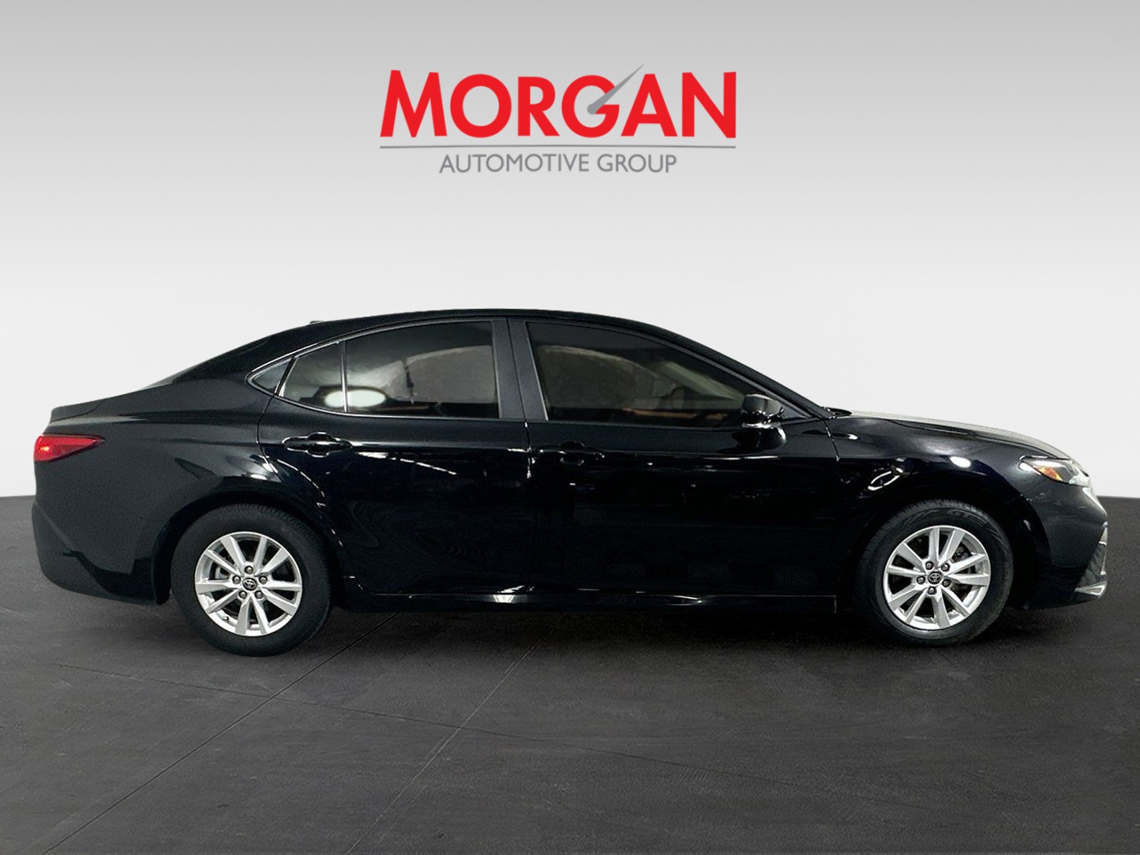 Used 2025 Midnight Black Metallic Toyota LE image 2