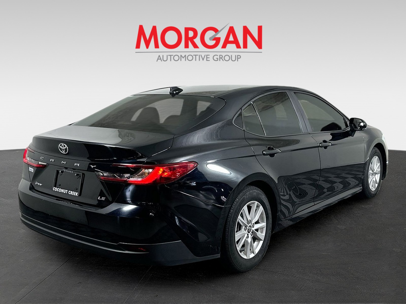 Used 2025 Midnight Black Metallic Toyota LE image 3