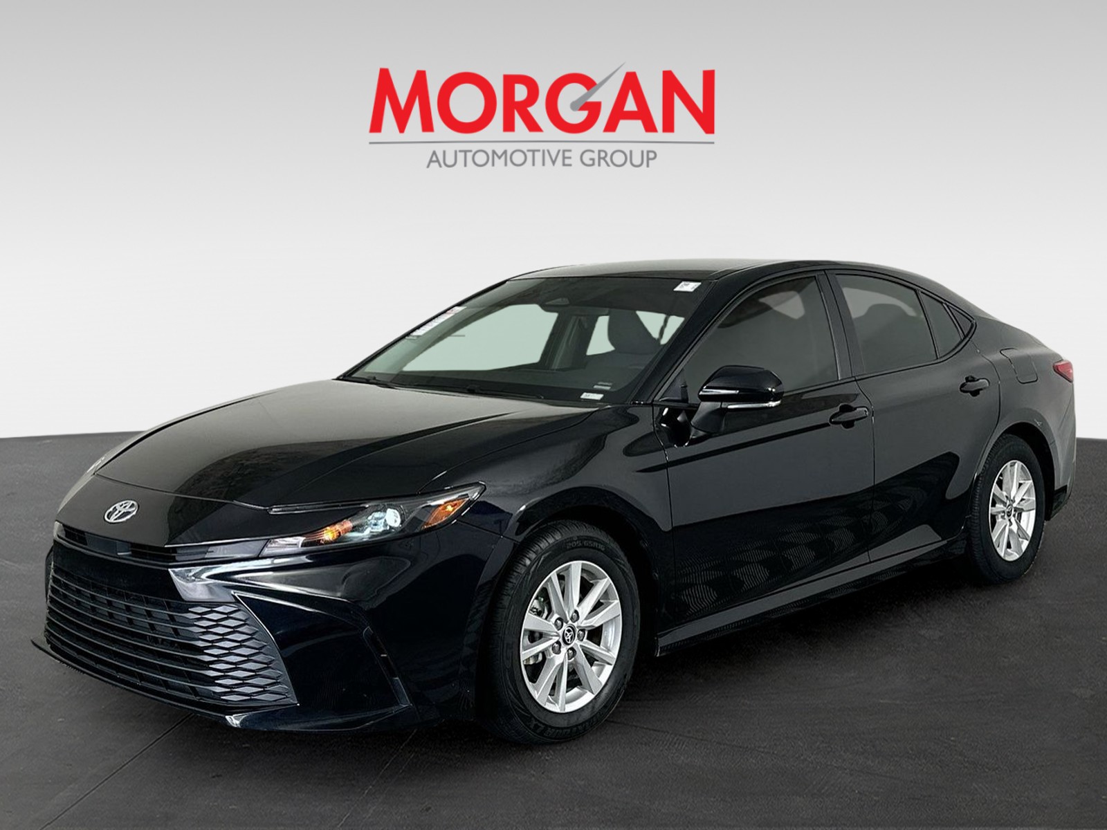 Used 2025 Midnight Black Metallic Toyota LE image 7