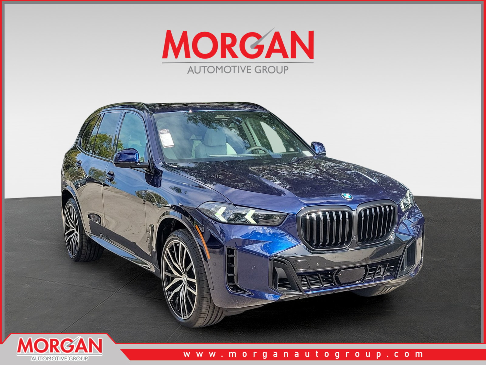 2026 BMW X5 sDrive40i in Tanzanite Blue II Metallic — front three-quarter view
